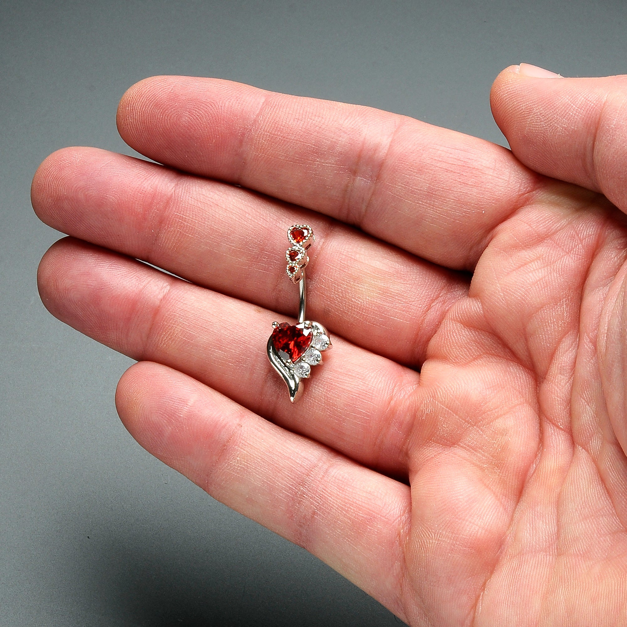 BodyCandy Red CZ Gem Triple Drop Flare Heart Valentine Double Mount Belly Ring — detail close-up