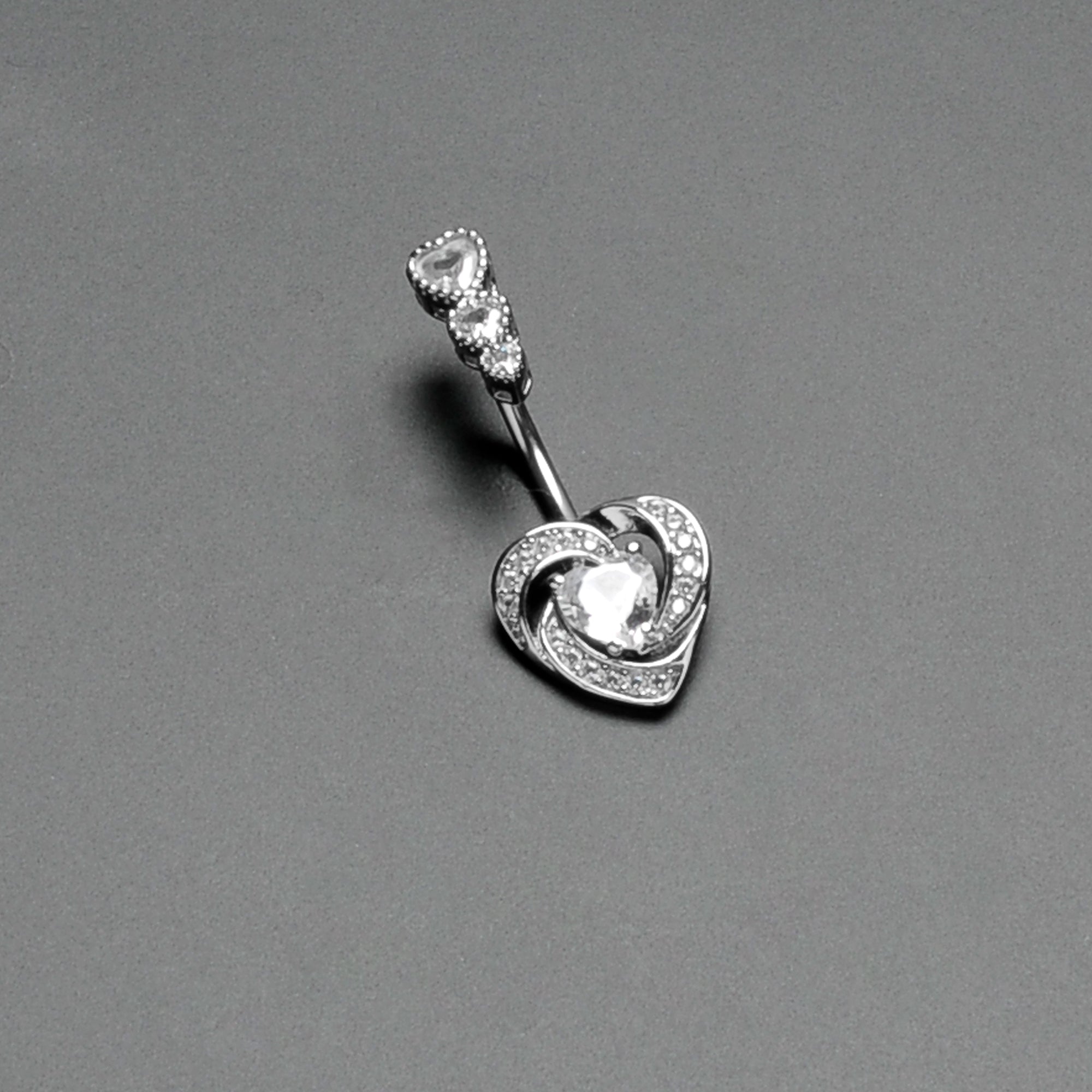 BodyCandy Clear CZ Gem Triple Drop Swirl Heart Valentine Double Mount Belly Ring — in-use photo