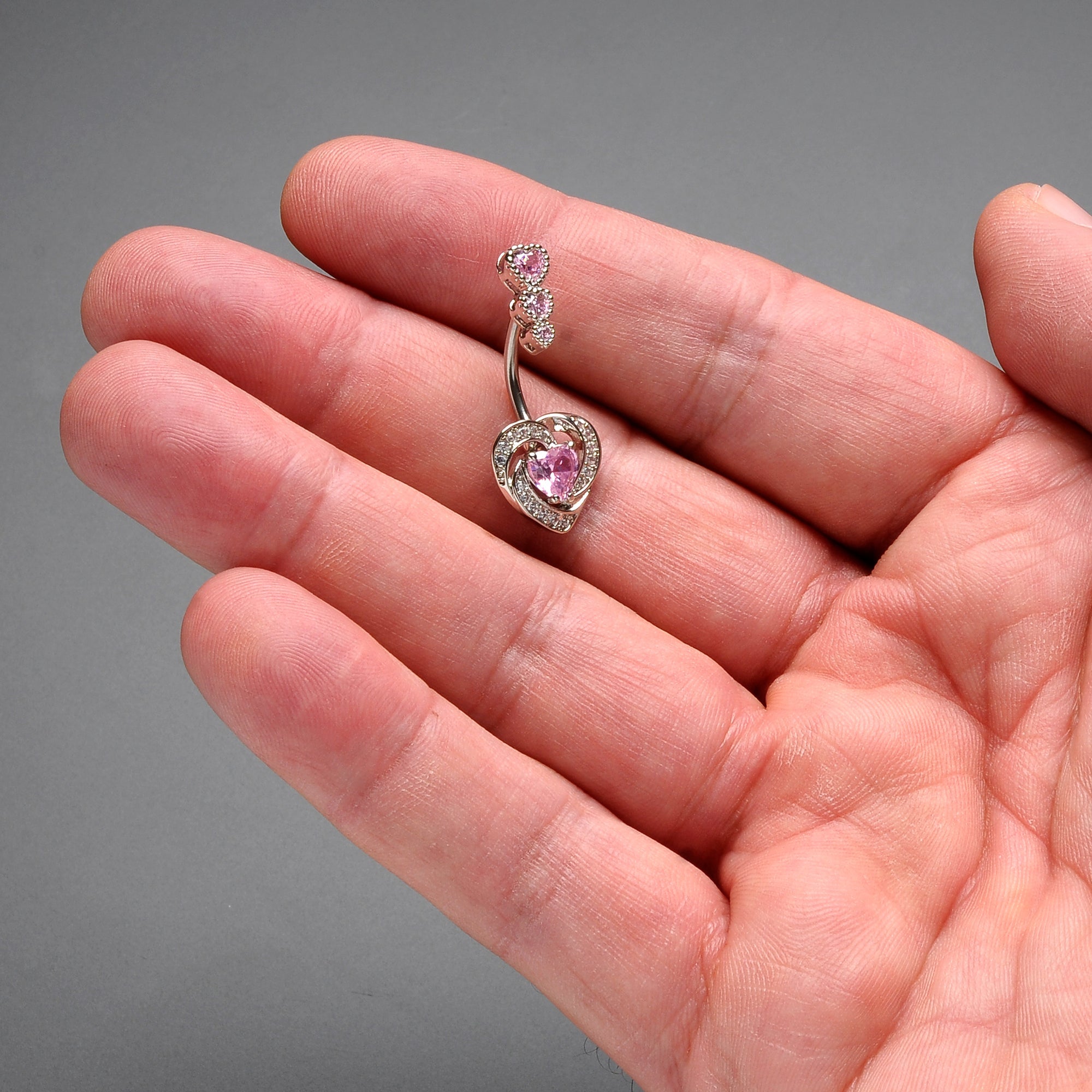 BodyCandy Pink CZ Gem Triple Drop Swirl Heart Valentine Double Mount Belly Ring — detail close-up
