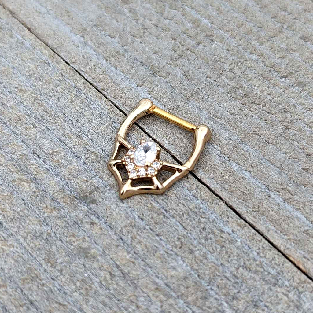 BodyCandy 16G 5/16 Clear Gem Gold Tone Spider Bat Cartilage Clicker — in-use photo