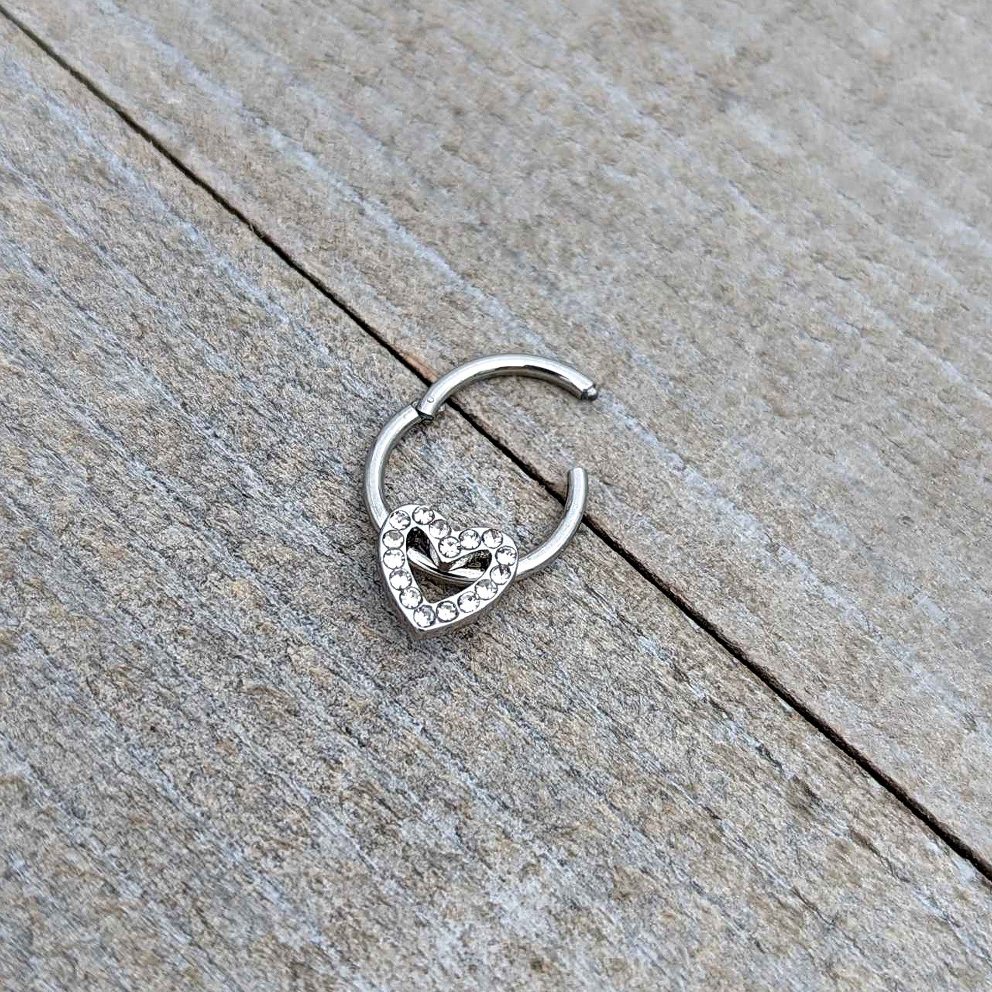 BodyCandy 16G 3/8 Clear Gem Open Heart Valentine Hinged Segment Ring — in-use photo