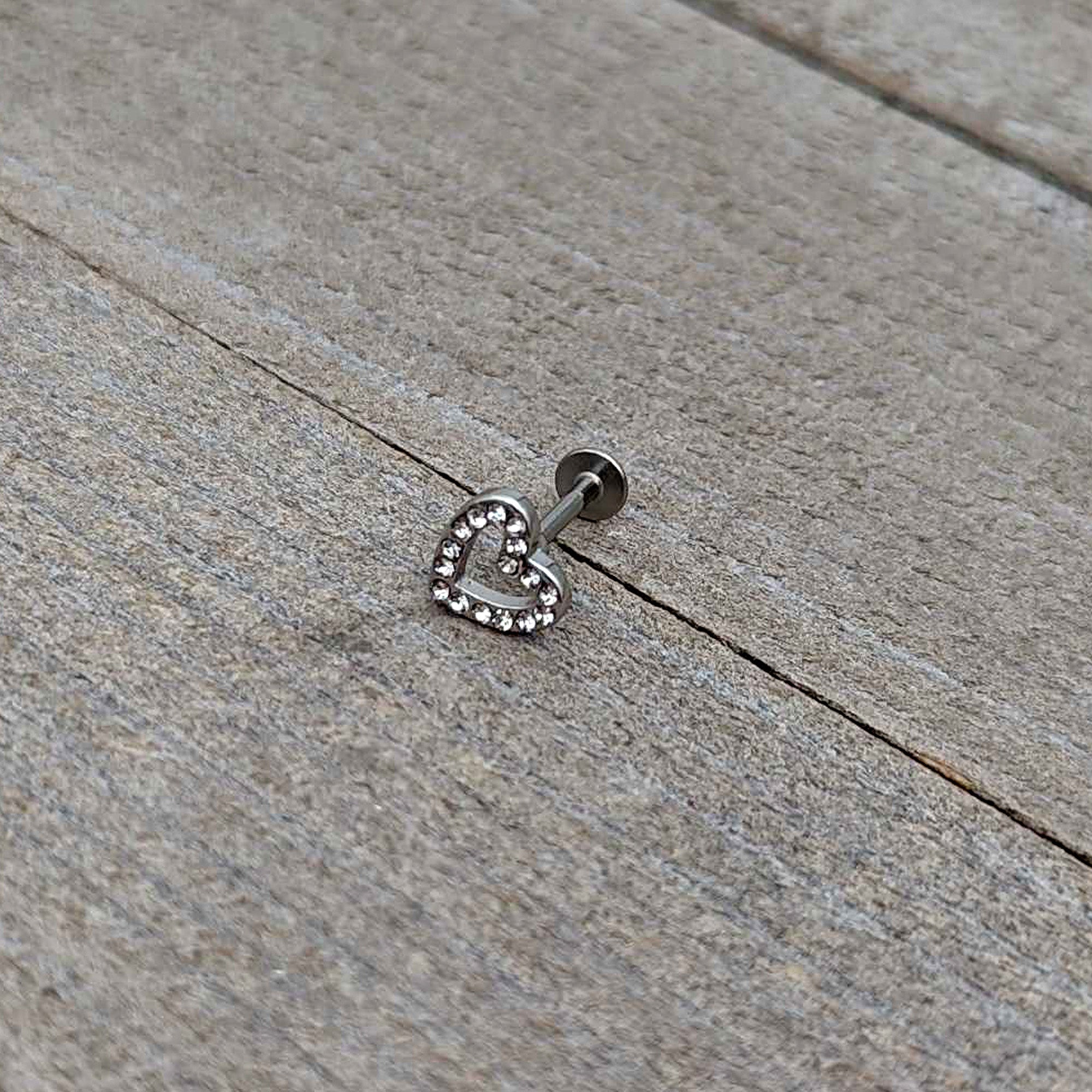 BodyCandy 16G 5/16 Clear Gem Open Heart Valentine Labret Monroe Tragus — in-use photo