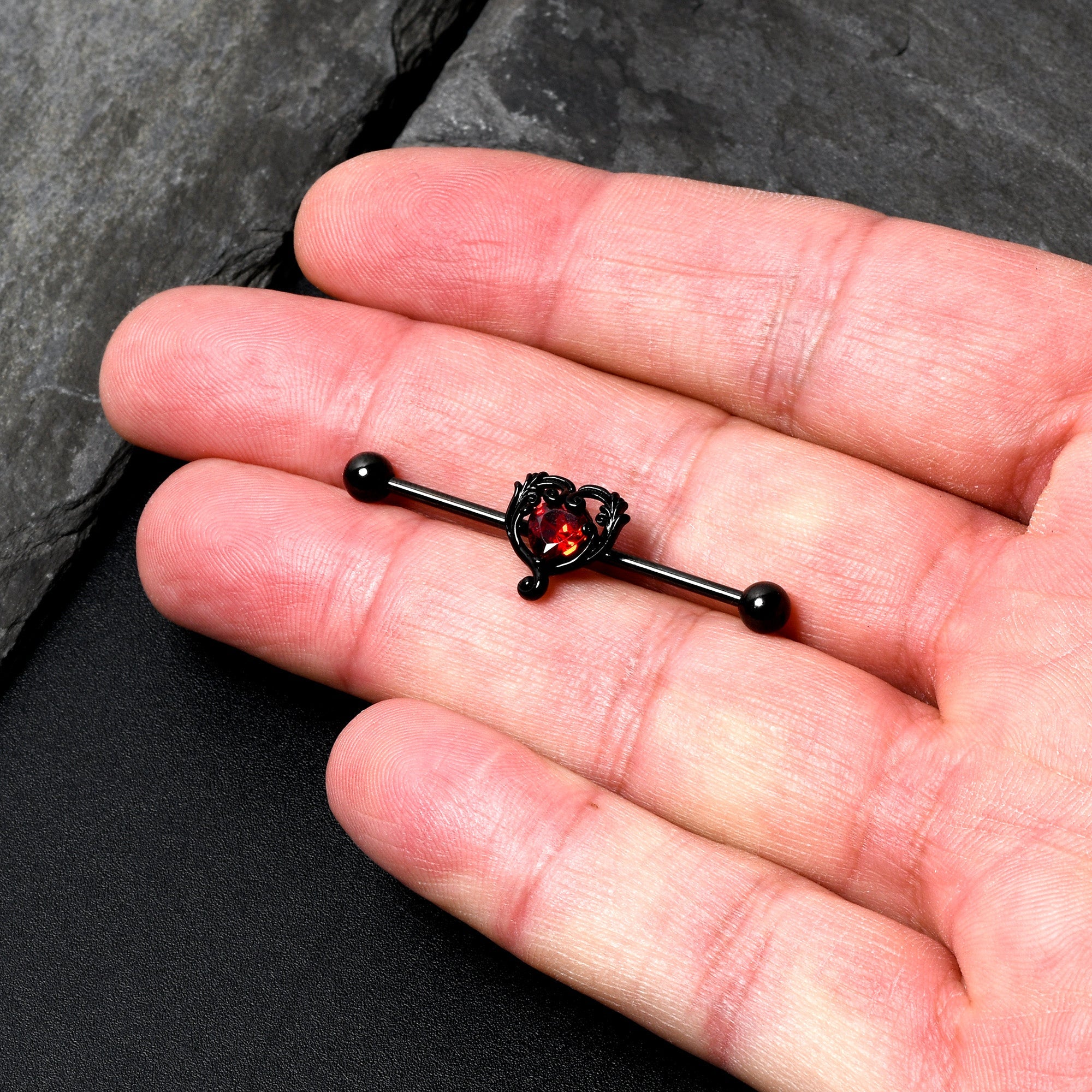BodyCandy 14G Red CZ Gem Black Passion Heart Industrial Barbell 38mm — lifestyle context