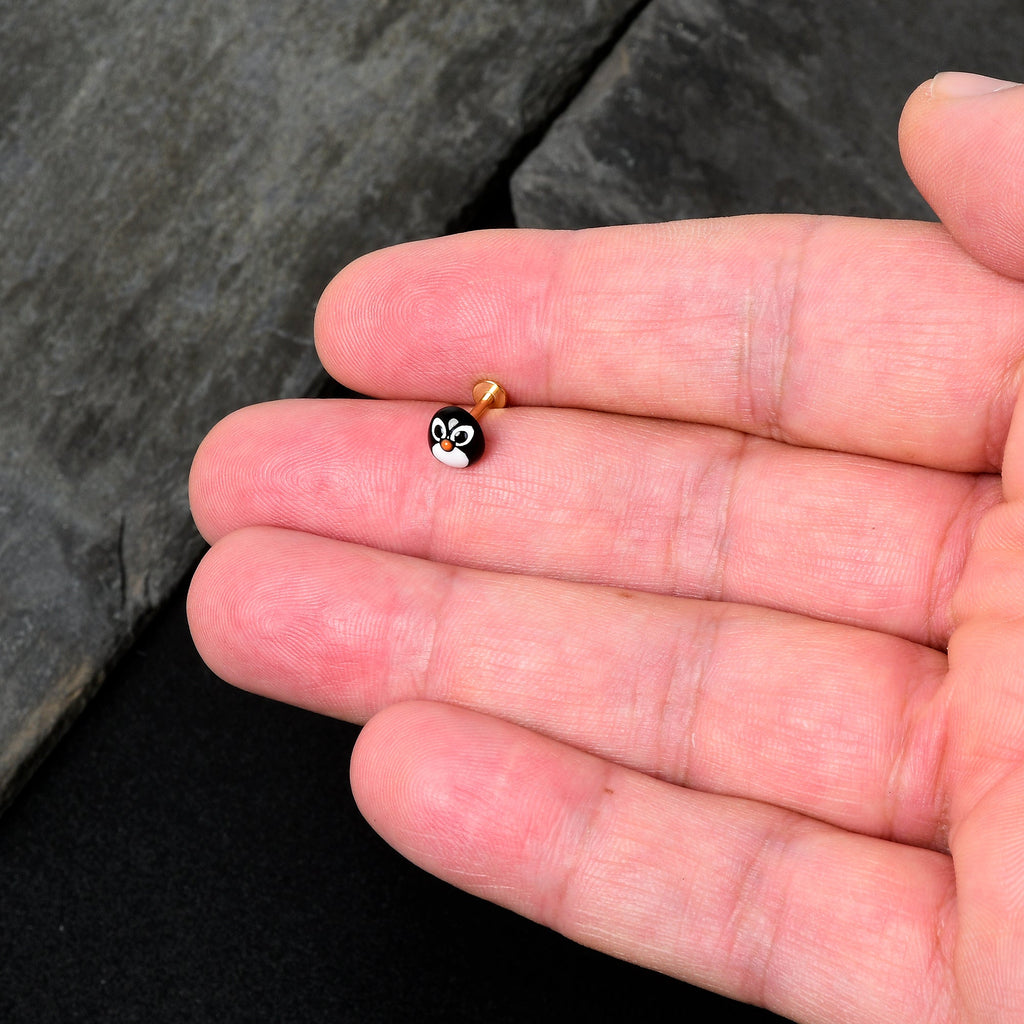 BodyCandy 16G 5/16 Gold Hue Round Penguin Face Holiday Labret Monroe Tragus — lifestyle context