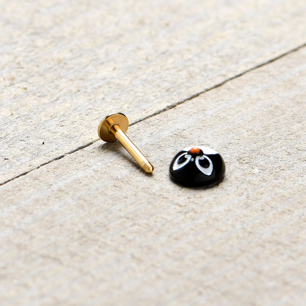 BodyCandy 16G 5/16 Gold Hue Round Penguin Face Holiday Labret Monroe Tragus — side view