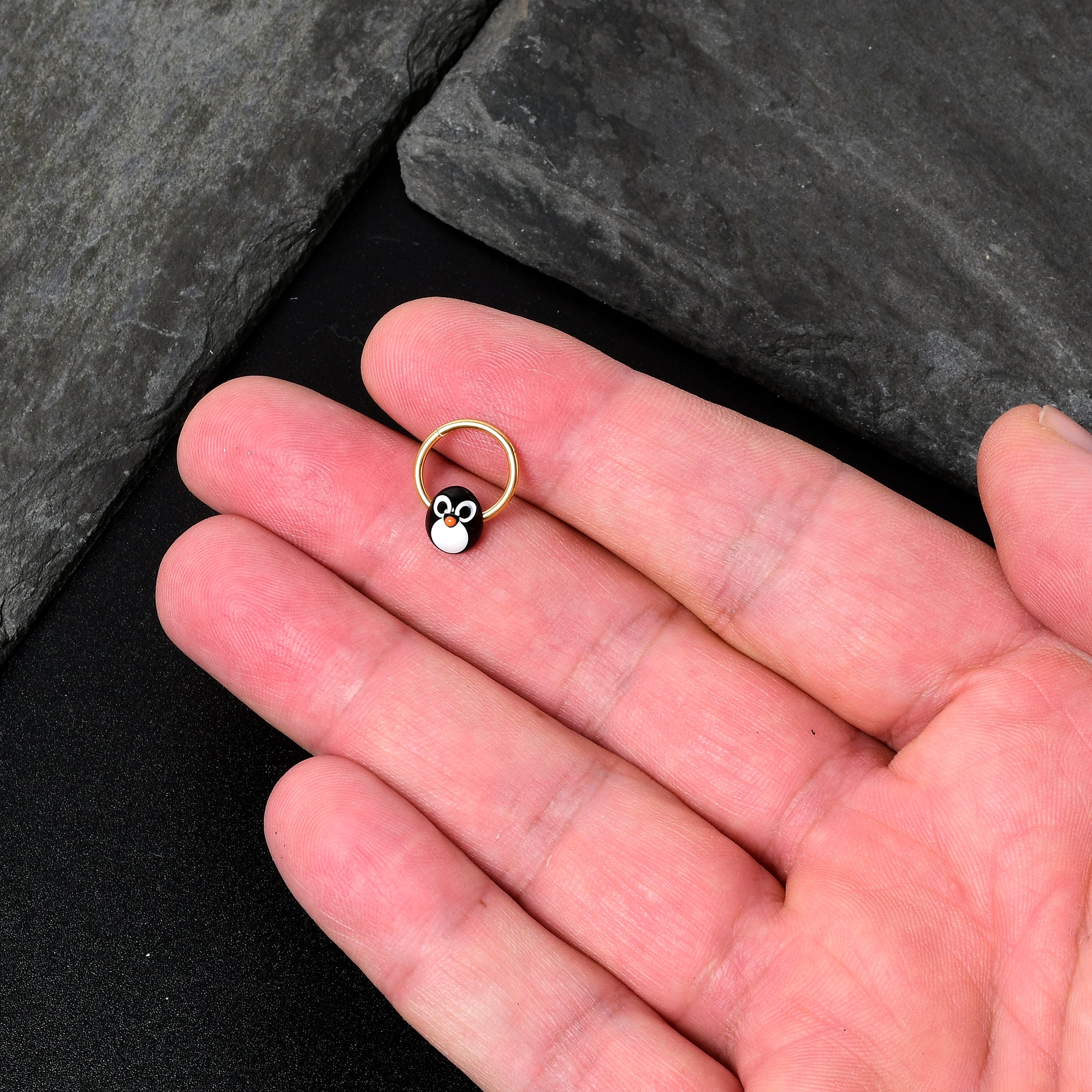 BodyCandy 16G 3/8 Gold Tone Round Penguin Face Holiday Hinged Segment Ring — back view