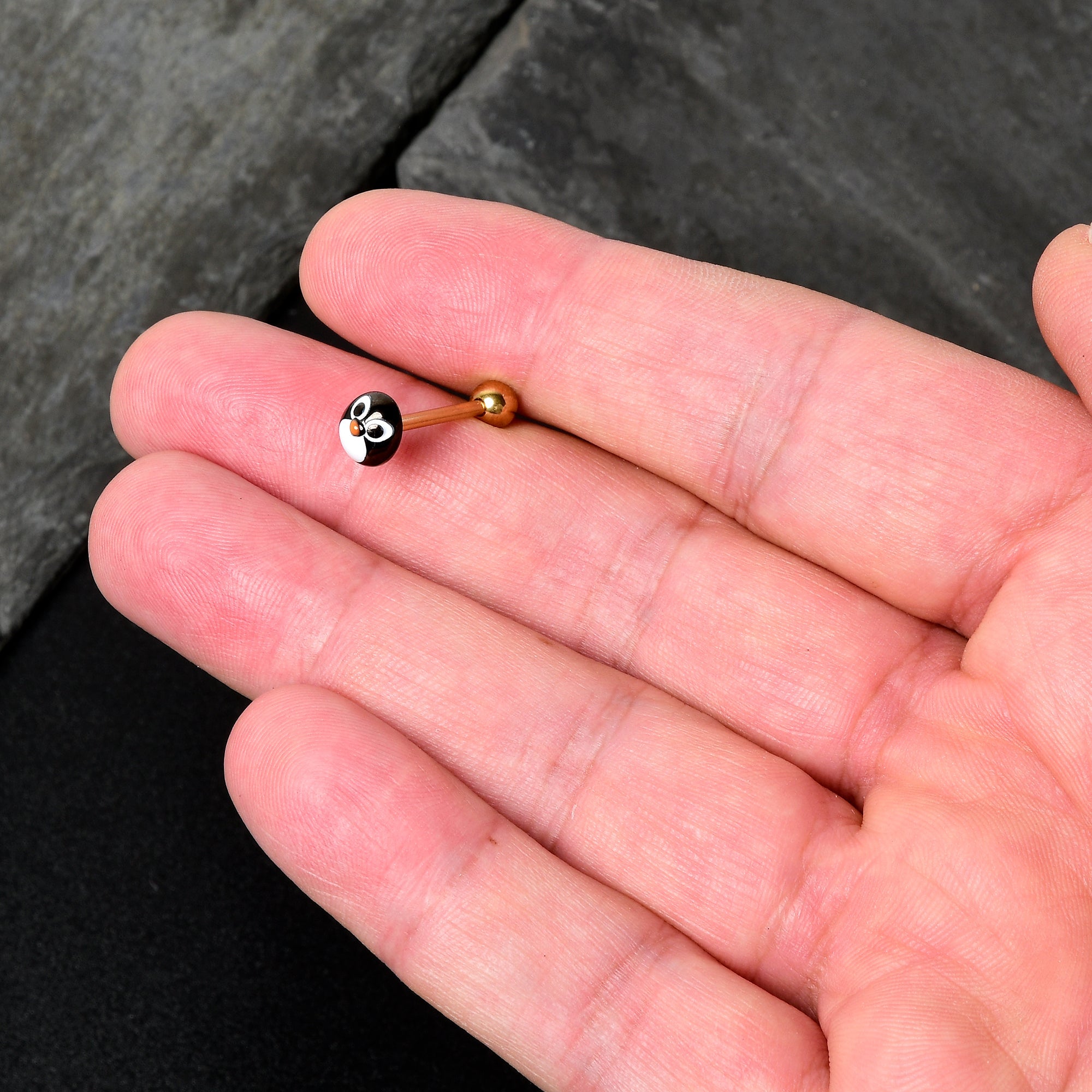 BodyCandy Gold Tone Round Holiday Penguin Face Barbell Tongue Ring — back view