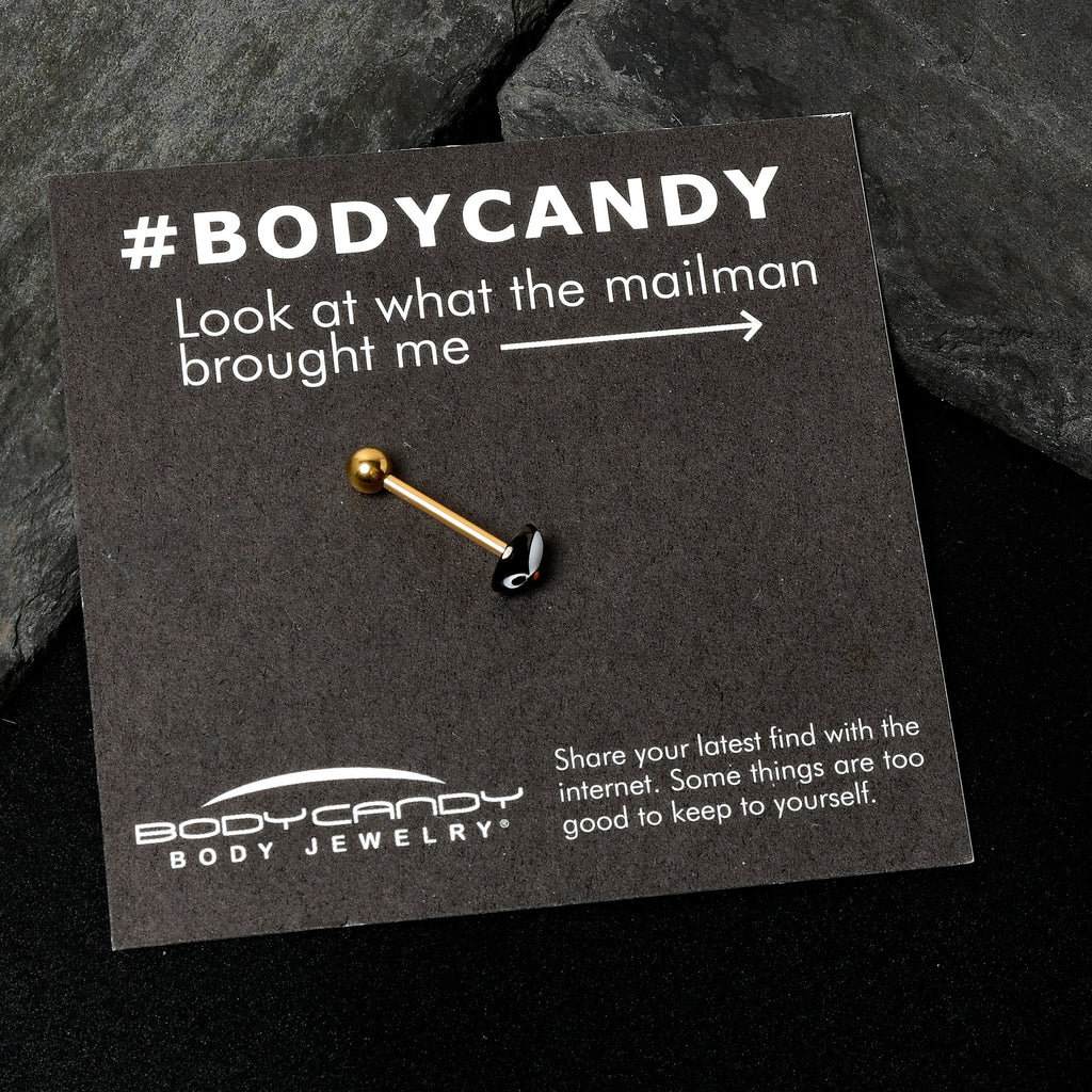 BodyCandy Gold Tone Round Holiday Penguin Face Barbell Tongue Ring — in-use photo