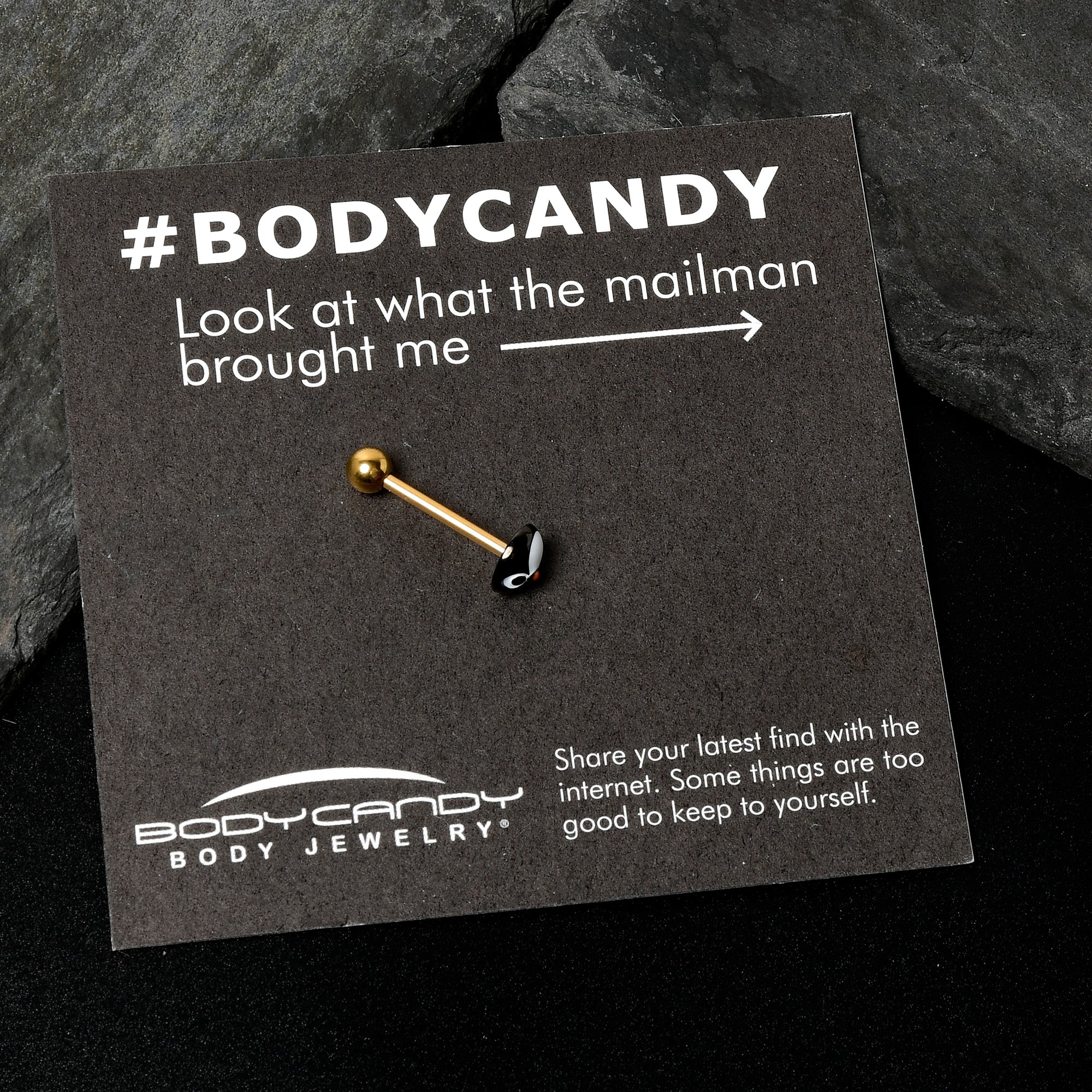 BodyCandy Gold Tone Round Holiday Penguin Face Barbell Tongue Ring — in-use photo