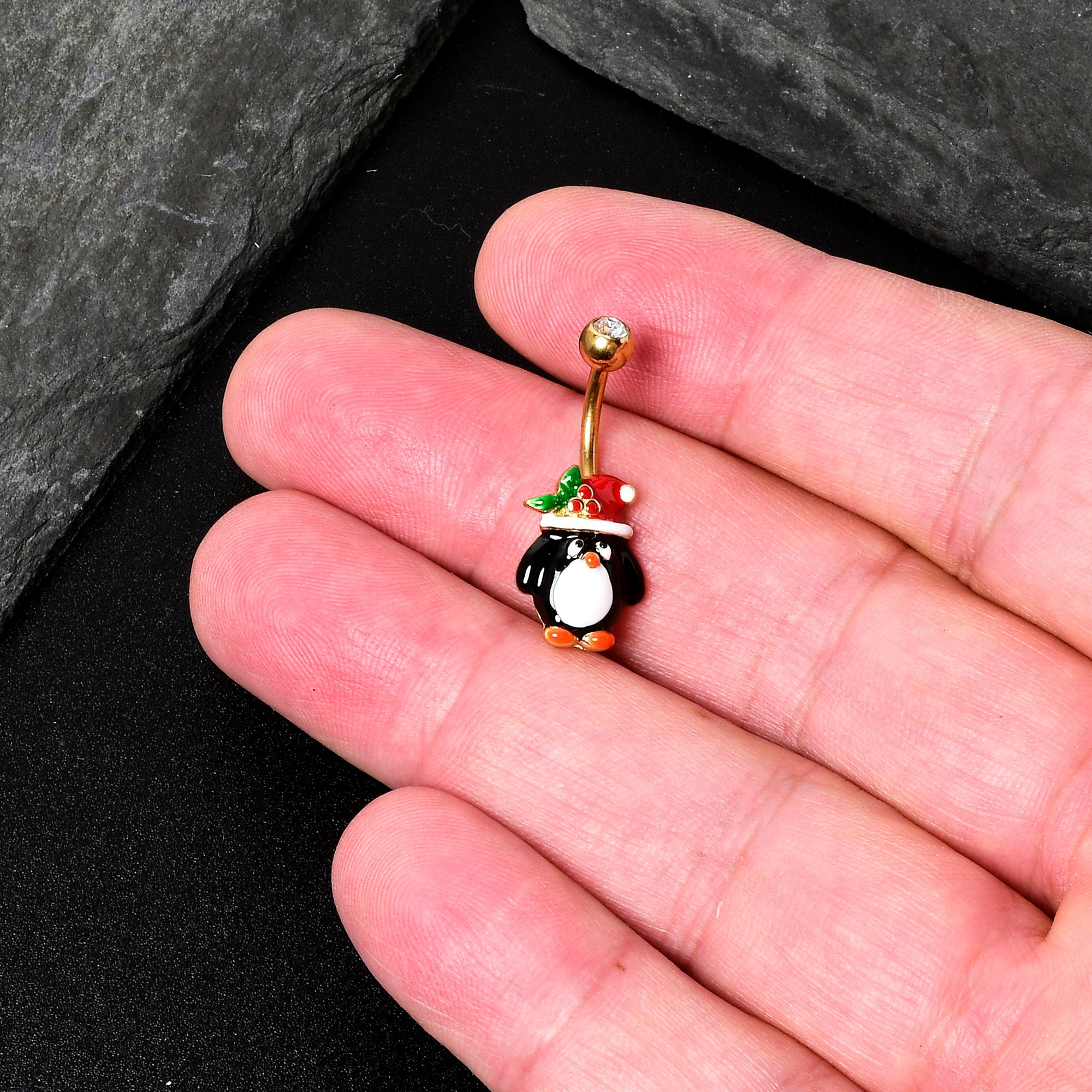 BodyCandy Clear Gem Gold Tone Holly Hat Penguin Holiday Belly Ring — in-use photo