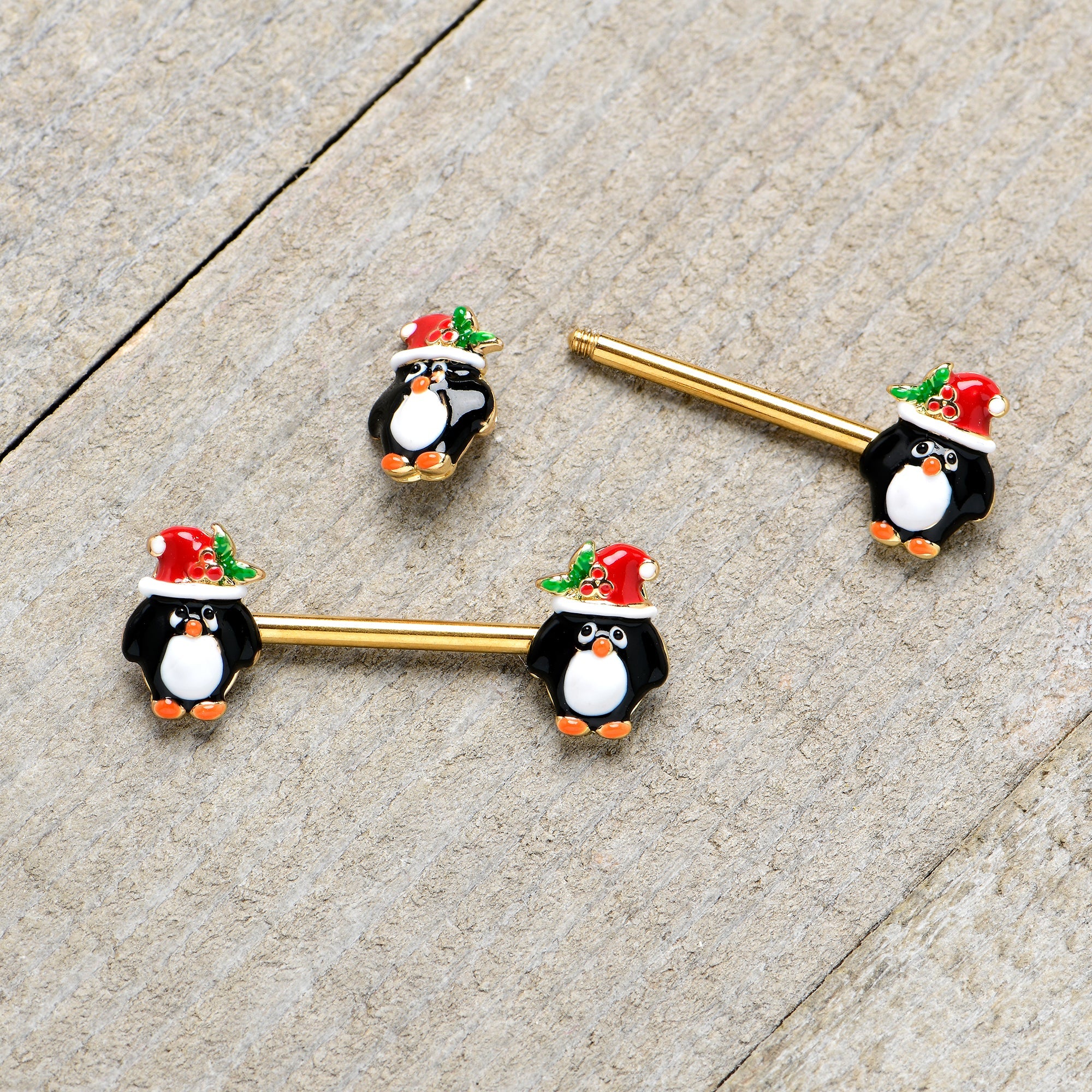 BodyCandy 14G 9/16 Gold Tone Holly Hat Penguin Barbell Nipple Ring Set — back view