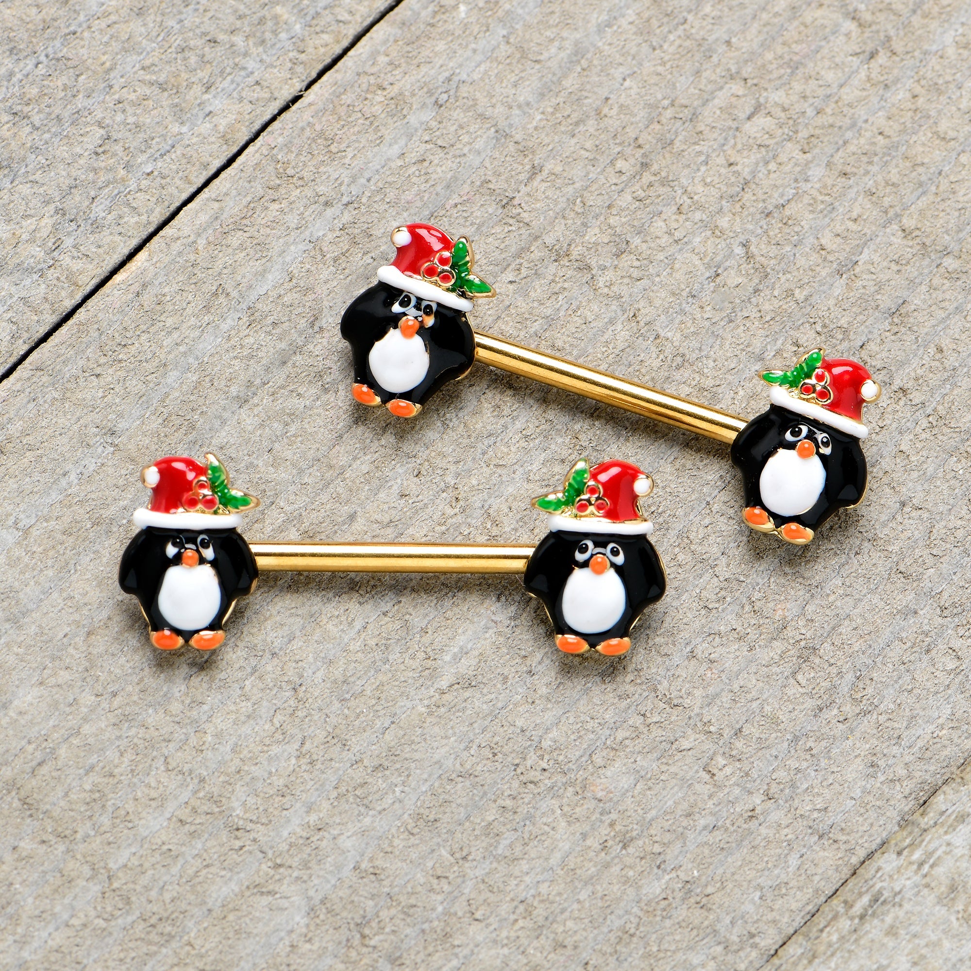 BodyCandy 14G 9/16 Gold Tone Holly Hat Penguin Barbell Nipple Ring Set — in-use photo