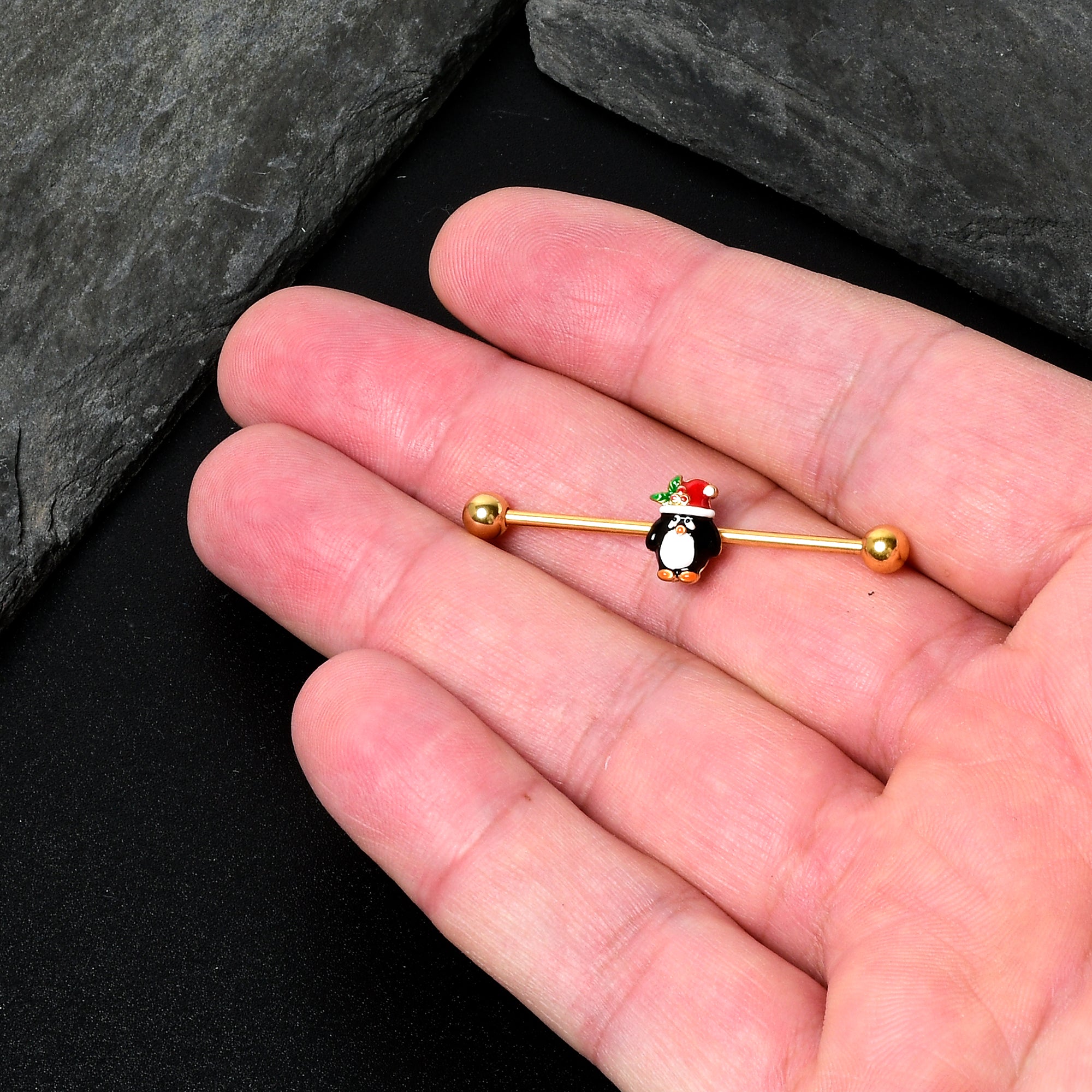 BodyCandy 14G Gold Tone Holly Hat Penguin Holiday Industrial Barbell 38mm — in-use photo