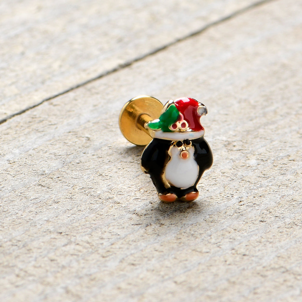 BodyCandy 16G 5/16 Gold Tone Holly Hat Penguin Holiday Labret Monroe Tragus — in-use photo