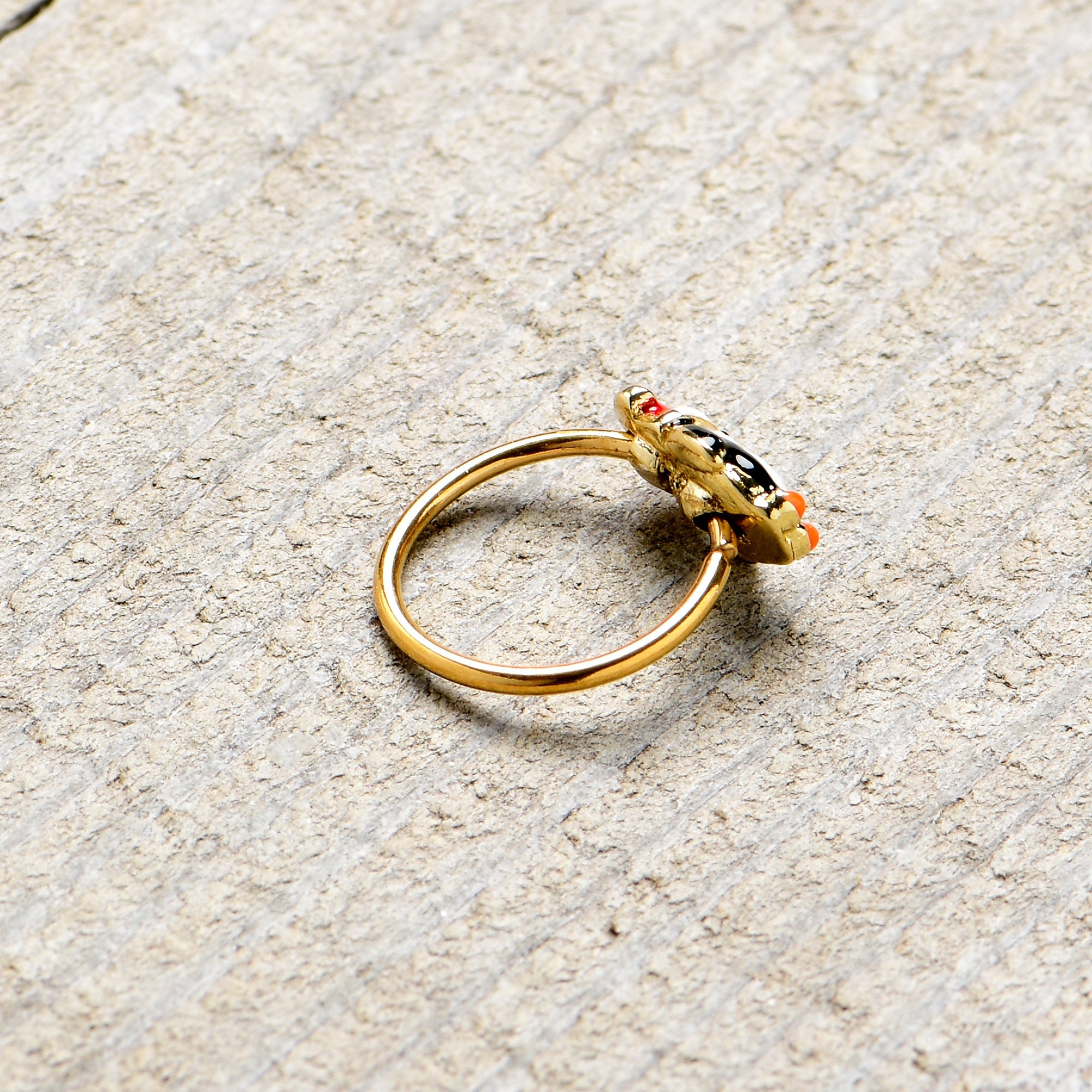BodyCandy 20G 5/16 Gold Tone Holly Hat Penguin Holiday Nose Hoop — back view