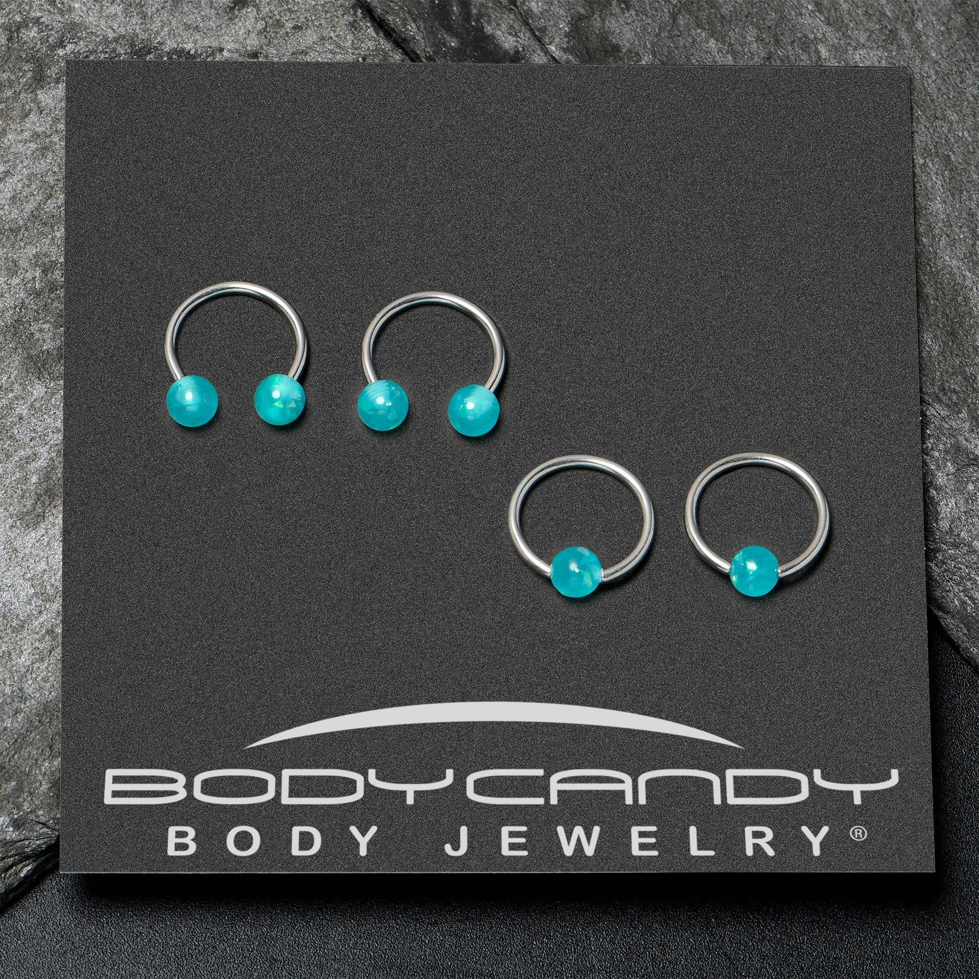 BodyCandy 16G 3/8 Teal Faux Opal Horseshoe BCR Captive Ring Set of 4 — back view