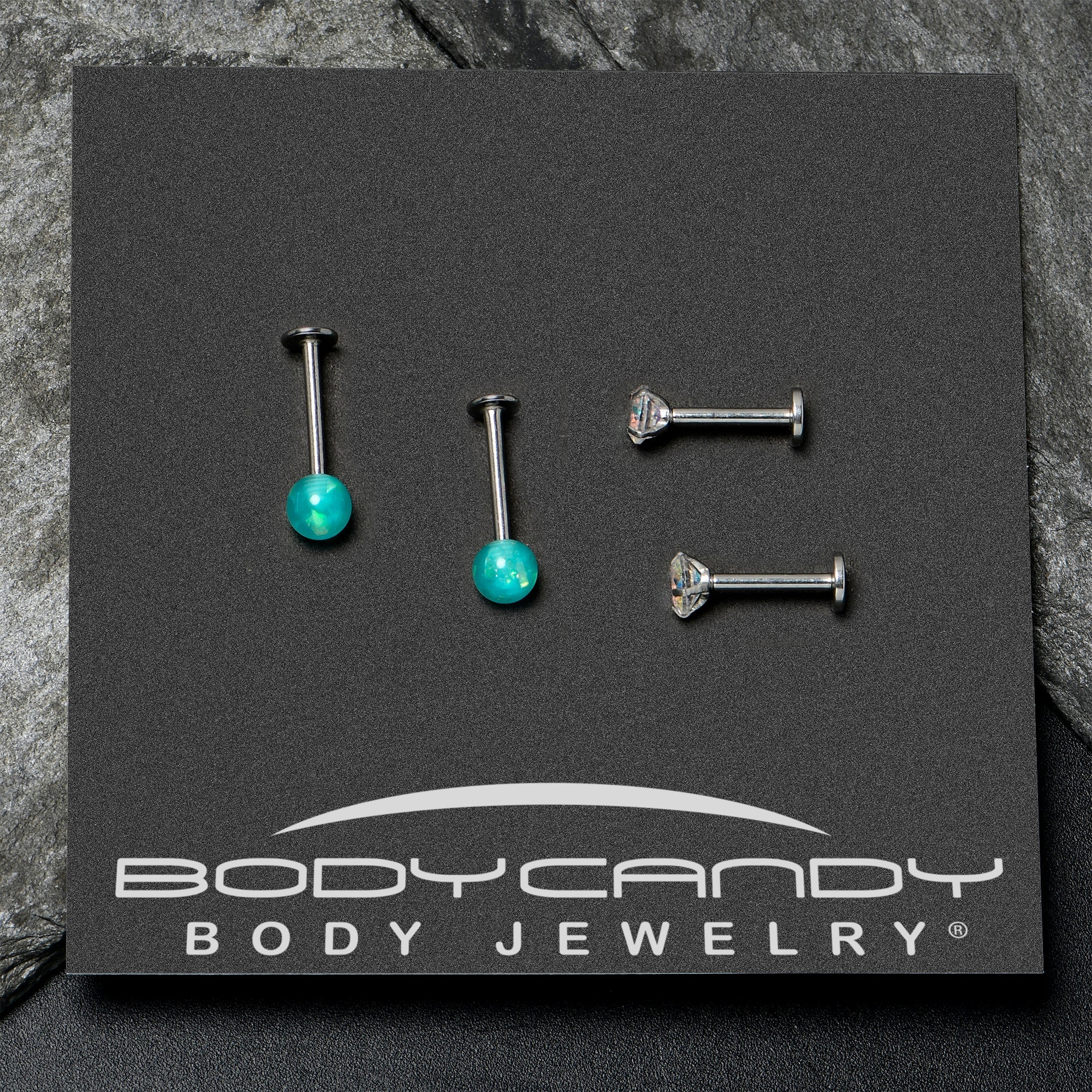 BodyCandy 16G 5/16 3/8 Aurora Gem Green Faux Opal Labret Monroe Set of 4 — in-use photo
