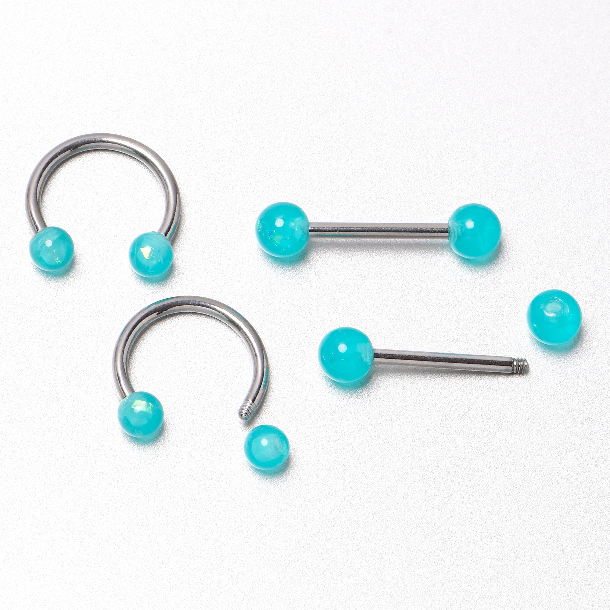 BodyCandy 14G 9/16 Green Faux Opal Horseshoe Barbell Nipple Ring Set of 4 — size reference