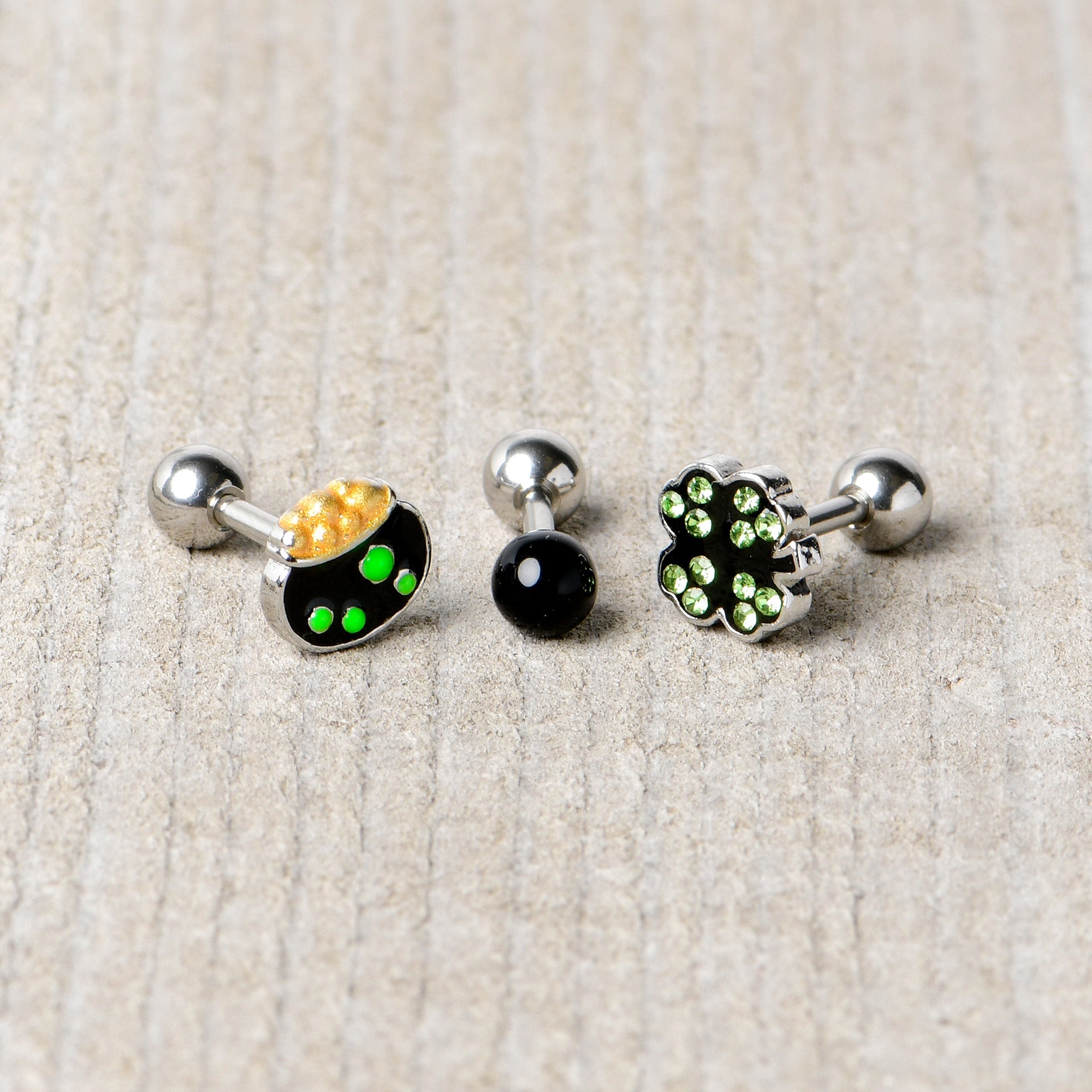 BodyCandy 16G 1/4 Green Gem  Shamrock Pot of Gold Cartilage Earring Curation Set of 3 — in-use photo