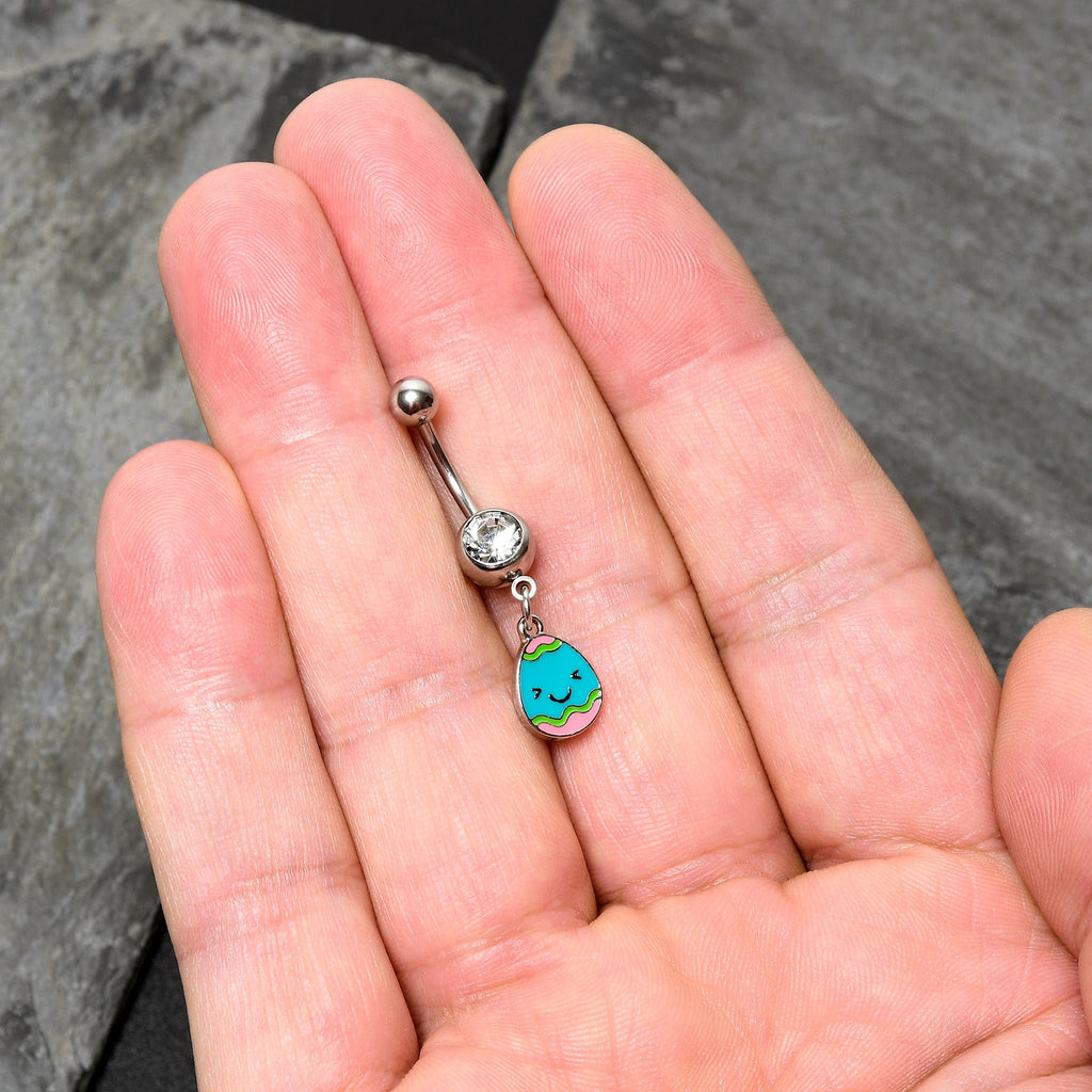 BodyCandy Clear Gem Celebration Easter Egg Dangle Belly Ring — in-use photo
