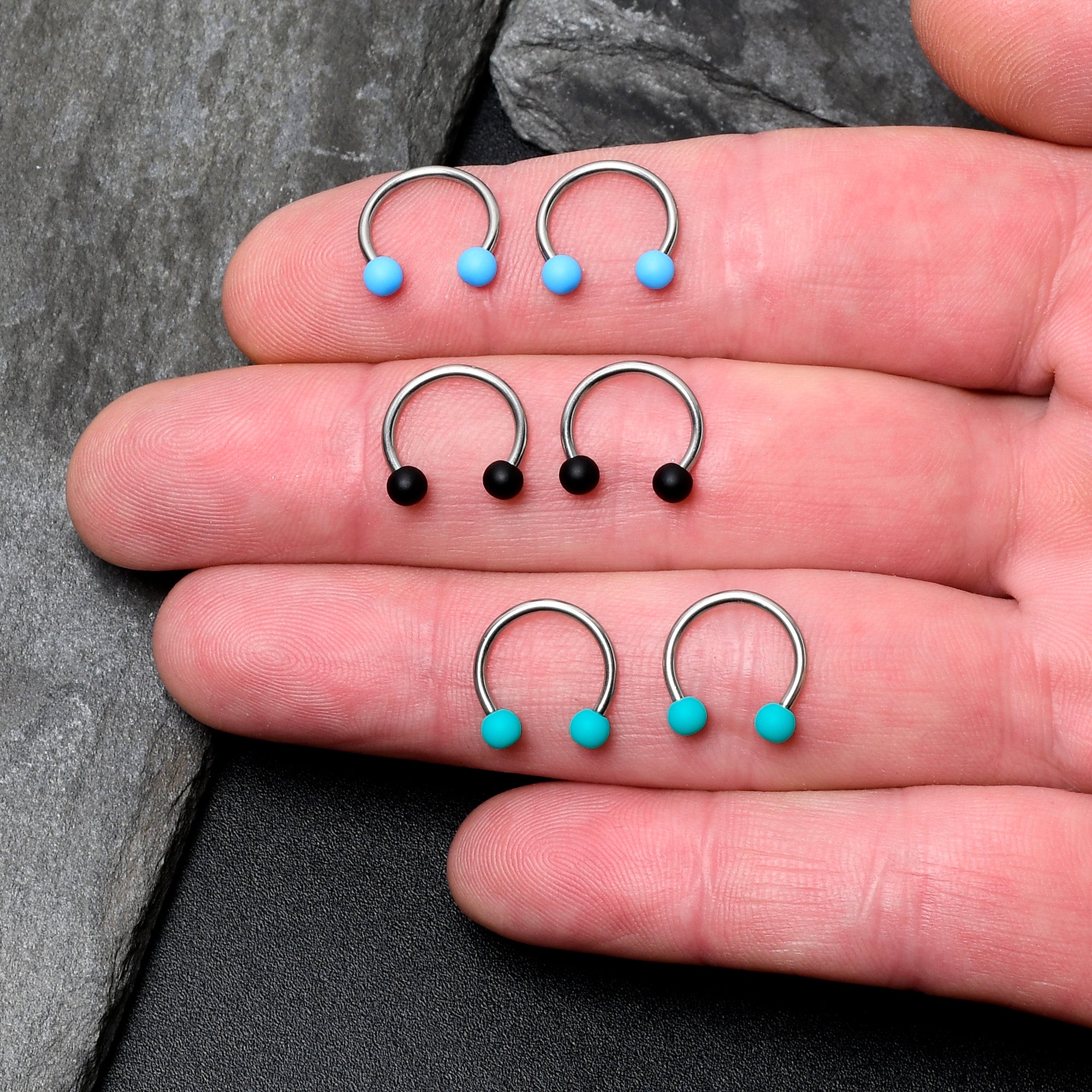BodyCandy 16G 3/8 Matte Black Blue Teal Horseshoe Circular Barbell Set of 6 — detail close-up