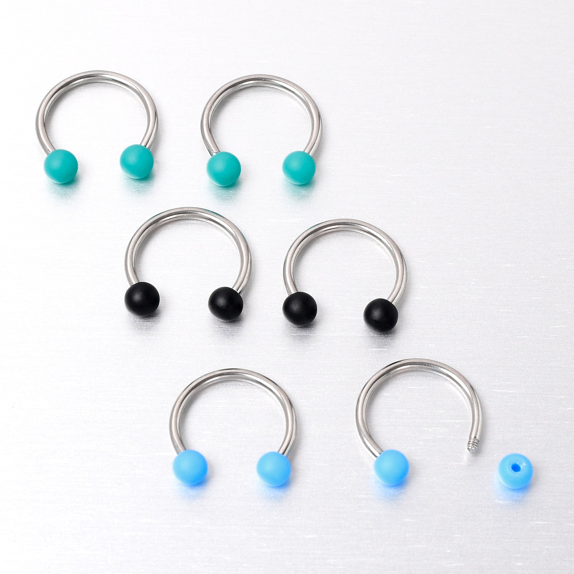 BodyCandy 16G 3/8 Matte Black Blue Teal Horseshoe Circular Barbell Set of 6 — size reference