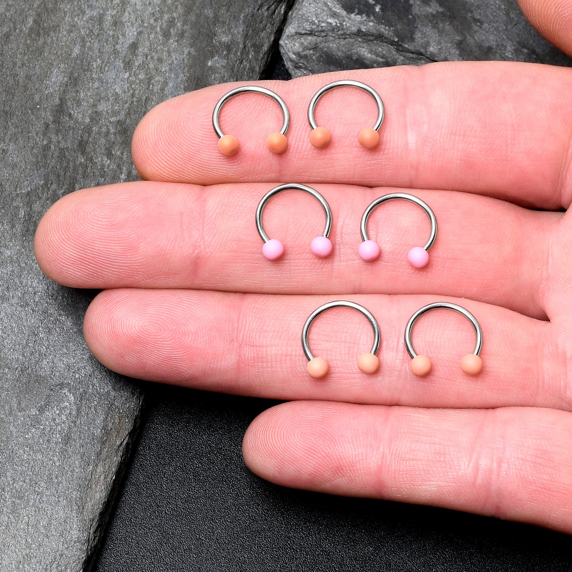 BodyCandy 16G 3/8 Matte Pinks Peach Horseshoe Circular Barbell Set of 6 — detail close-up