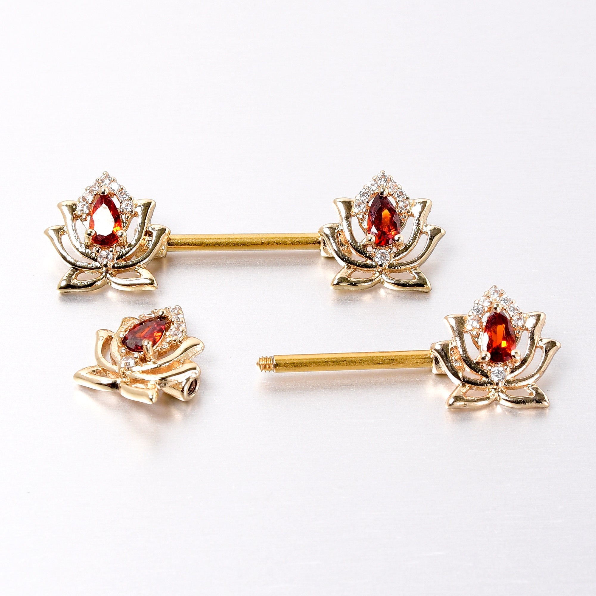 BodyCandy 14G 9/16 Red Gem Gold Tone Royal Lotus Barbell Nipple Ring Set — back view