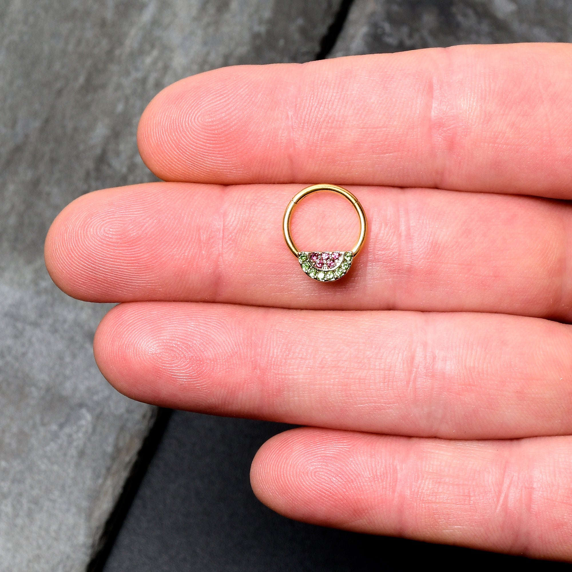 BodyCandy 16G 3/8 Pink Green Gem Gold Hue Watermelon Yum Hinged Segment Ring — lifestyle context