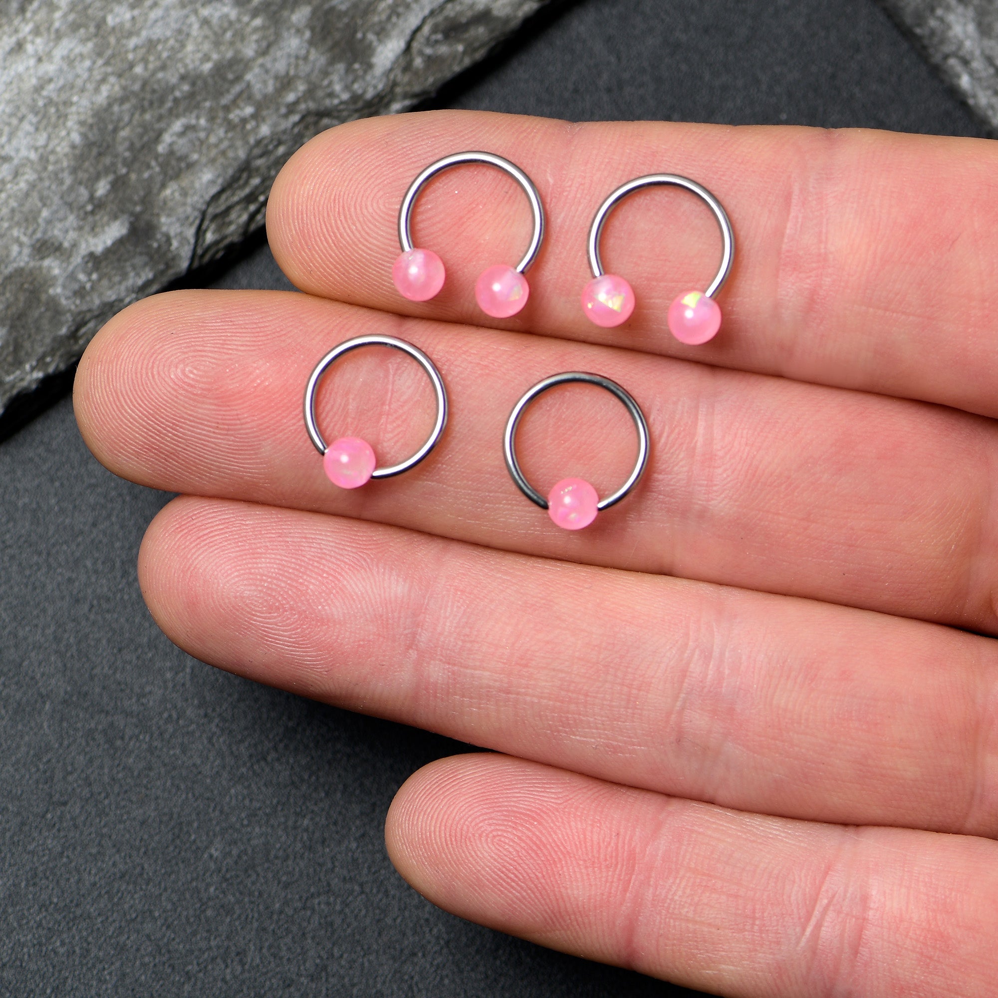BodyCandy 16G 3/8 Pink Faux Opal Horseshoe BCR Captive Ring Set of 4 — side view