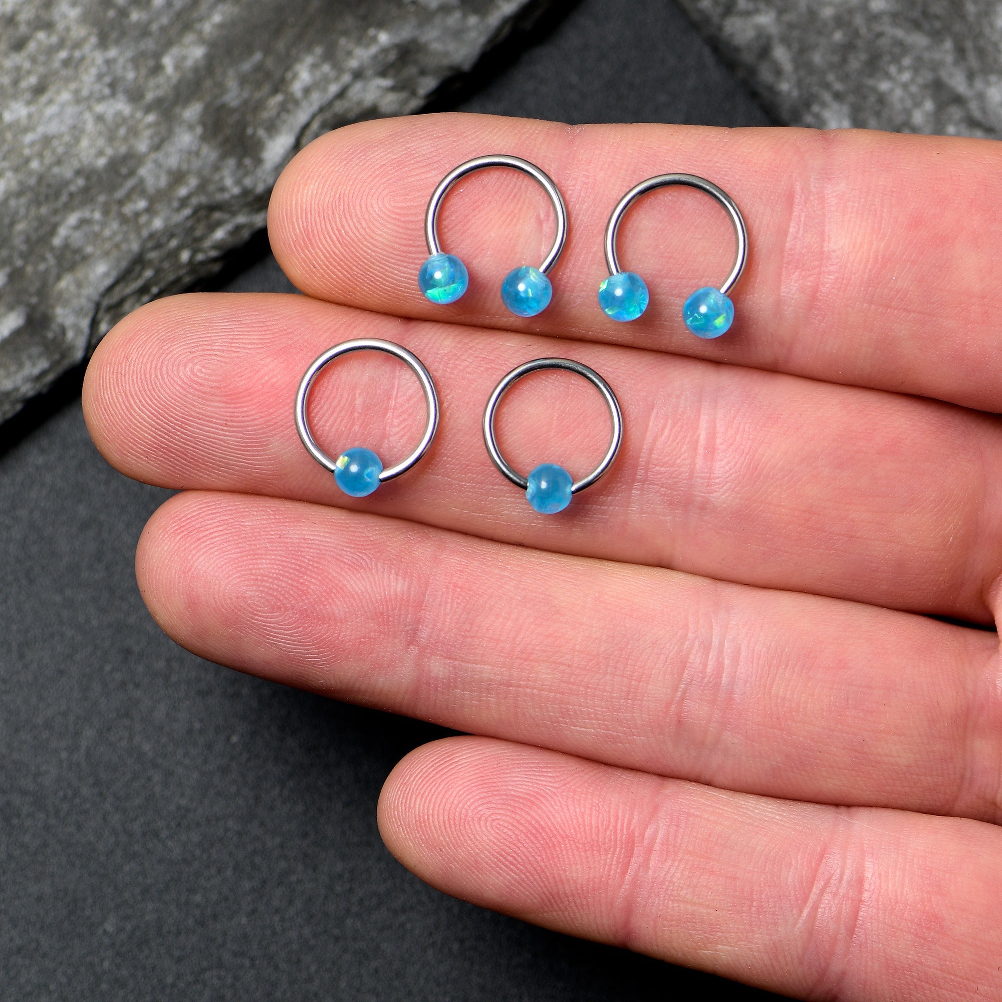 BodyCandy 16G 3/8 Blue Faux Opal Horseshoe BCR Captive Ring Set of 4 — side view