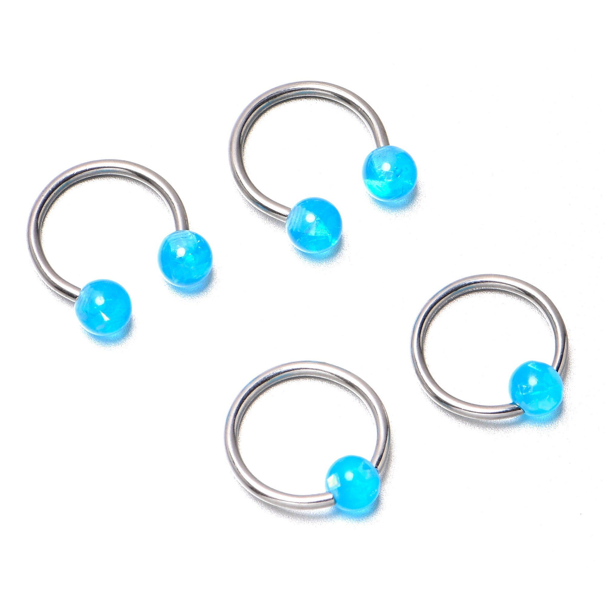 BodyCandy 16G 3/8 Blue Faux Opal Horseshoe BCR Captive Ring Set of 4 — in-use photo