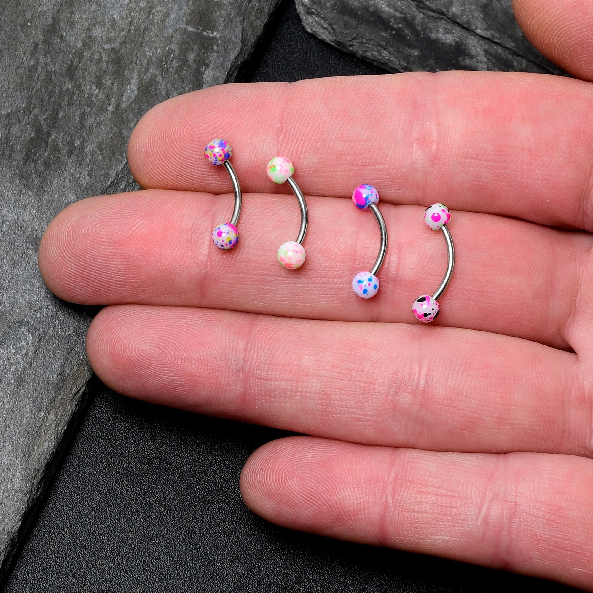 BodyCandy 16G 3/8 Splatter Pink Green Blue Curved Eyebrow Ring Set of 4 — detail close-up