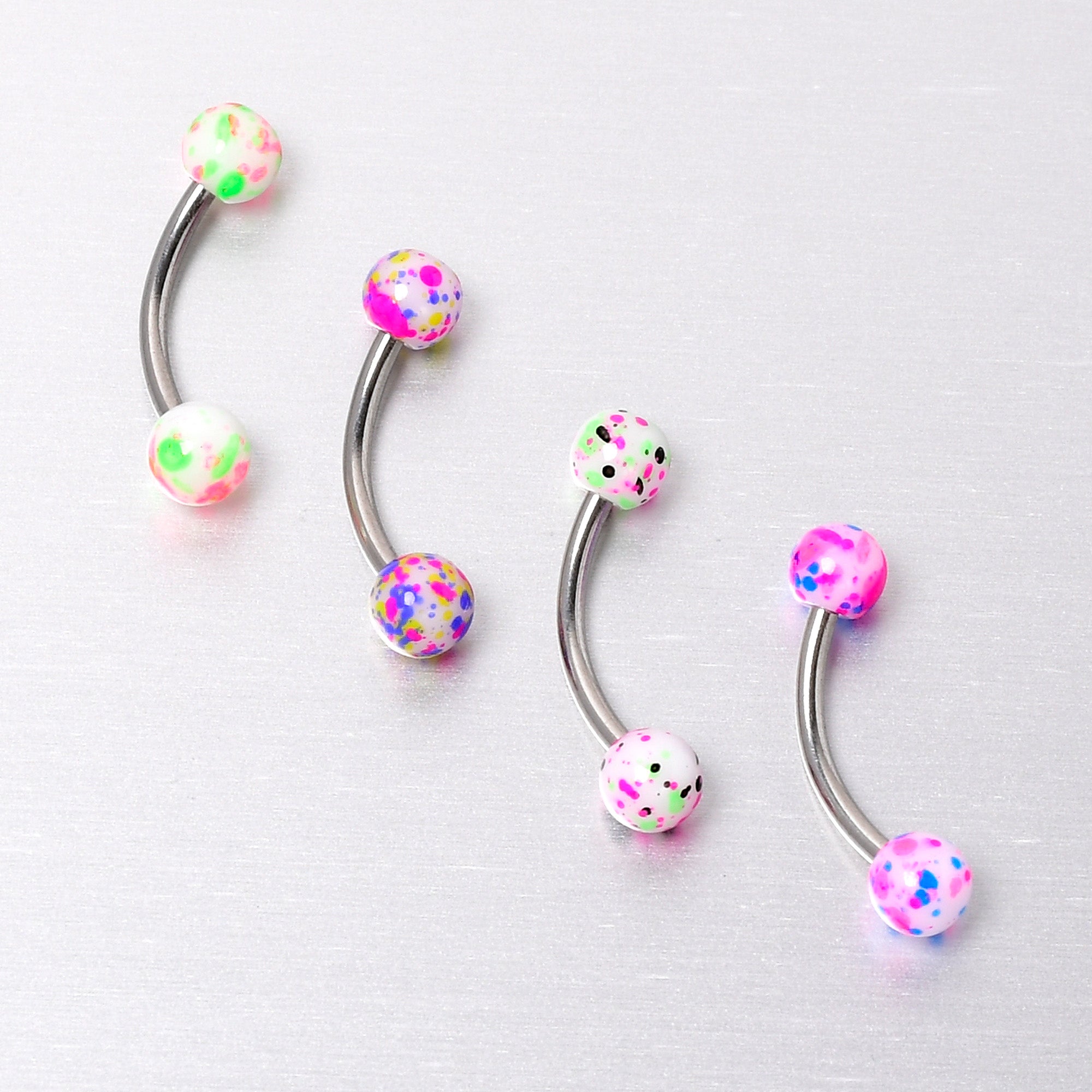 BodyCandy 16G 3/8 Splatter Pink Green Blue Curved Eyebrow Ring Set of 4 — in-use photo