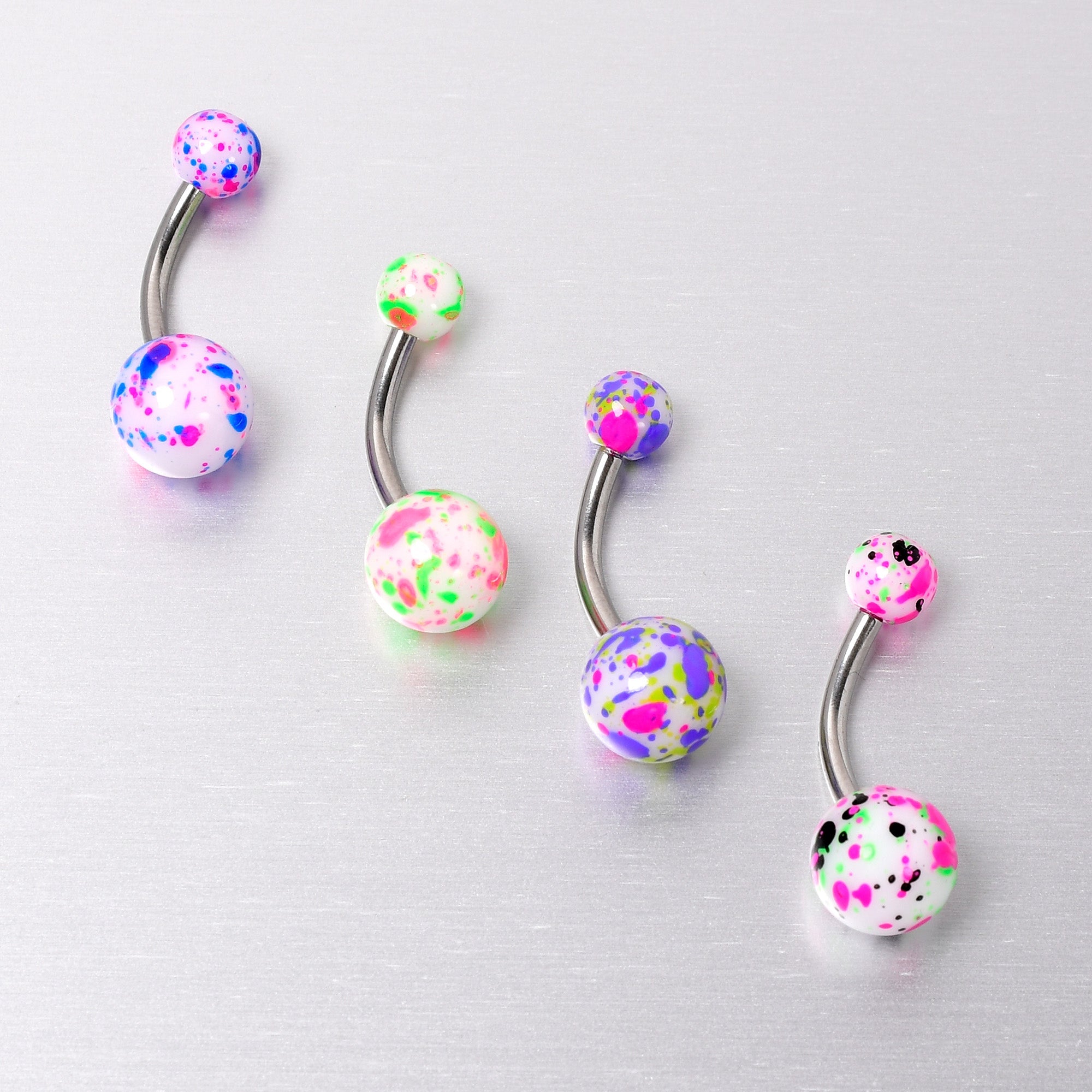BodyCandy Splatter Pink Blue Purple Green Belly Ring Set of 4 — in-use photo
