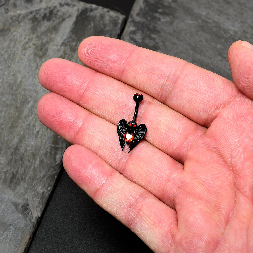 BodyCandy Red CZ Gem Black Heart Winged Skull Gothic Belly Ring — detail close-up