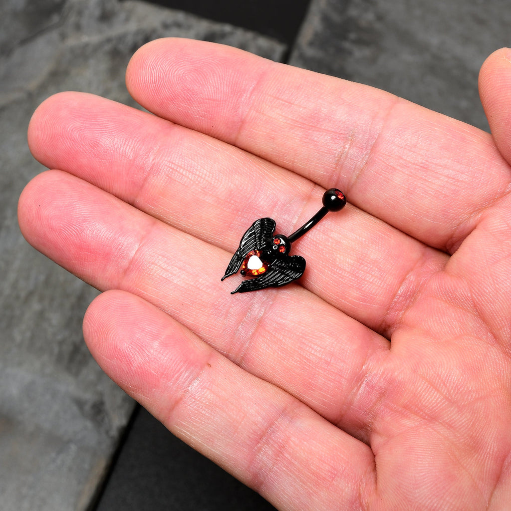 BodyCandy Red CZ Gem Black Heart Winged Skull Gothic Belly Ring — in-use photo