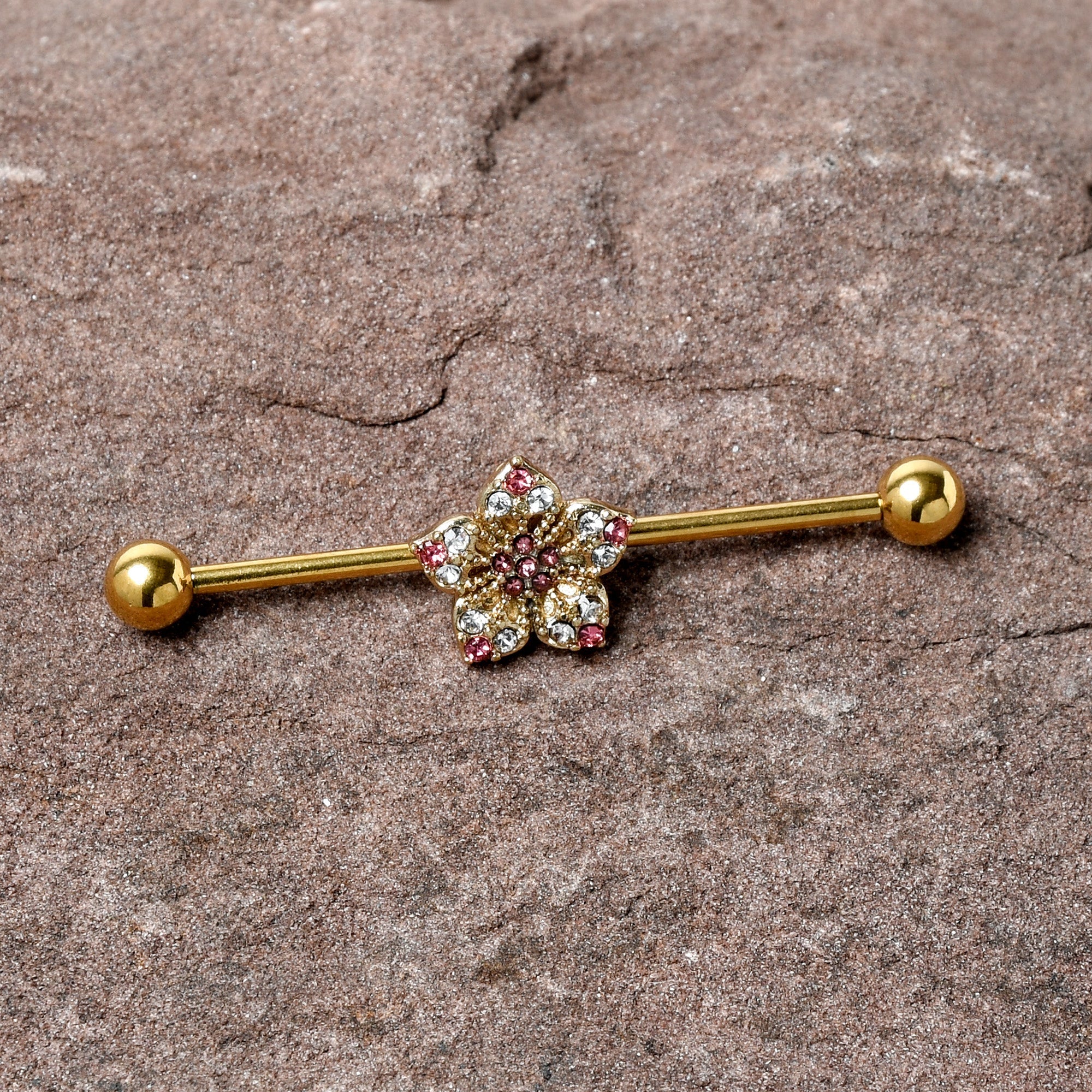 BodyCandy 14G Clear Pink Gem Gold Tone Texture Star Industrial Barbell 38mm — detail close-up