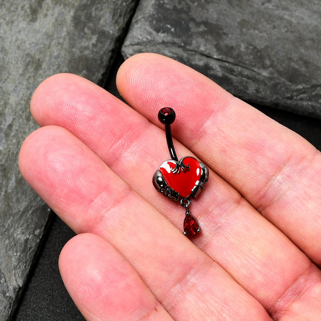 BodyCandy Red CZ Gem Black Double Skull Heart Dangle Belly Ring — detail close-up
