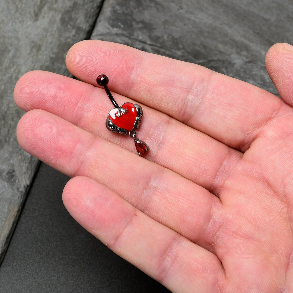 BodyCandy Red CZ Gem Black Double Skull Heart Dangle Belly Ring — in-use photo