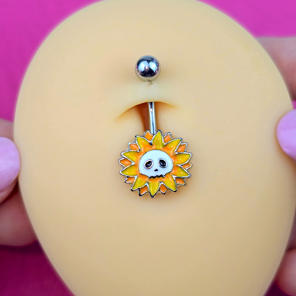 BodyCandy Sunflower Skull Belly Ring — detail close-up