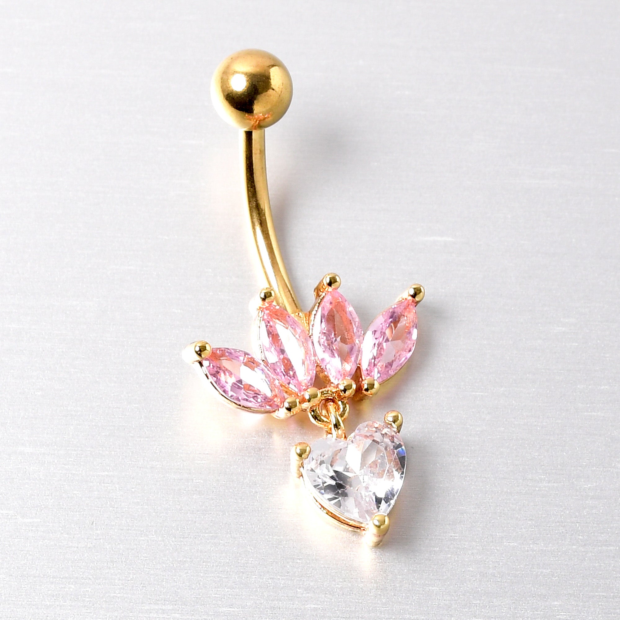 BodyCandy Clear Pink CZ Gem Gold Tone Crown And Heart Dangle Belly Ring — lifestyle context