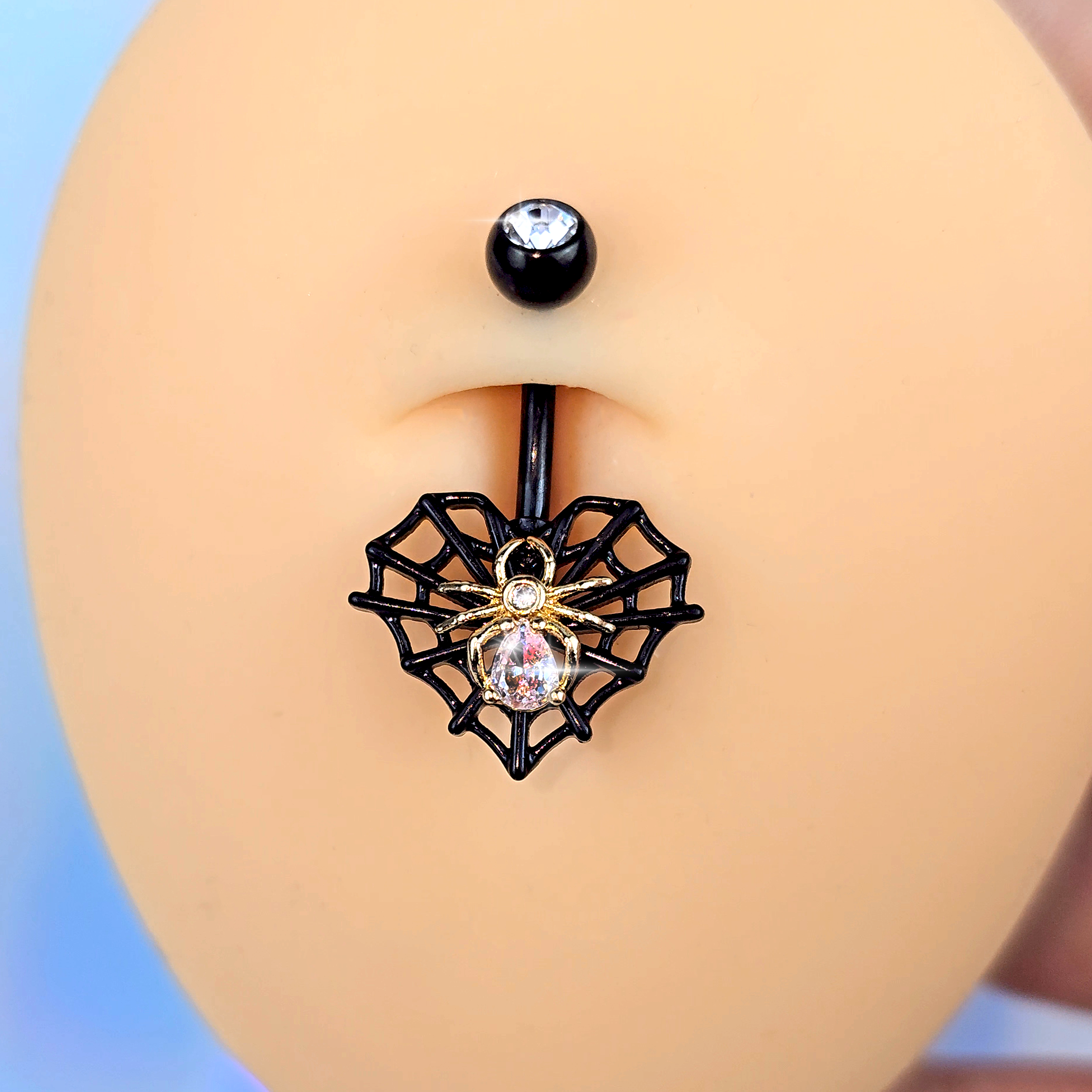 BodyCandy Clear Gem Black Golden Spider Web Heart Belly Ring — detail close-up