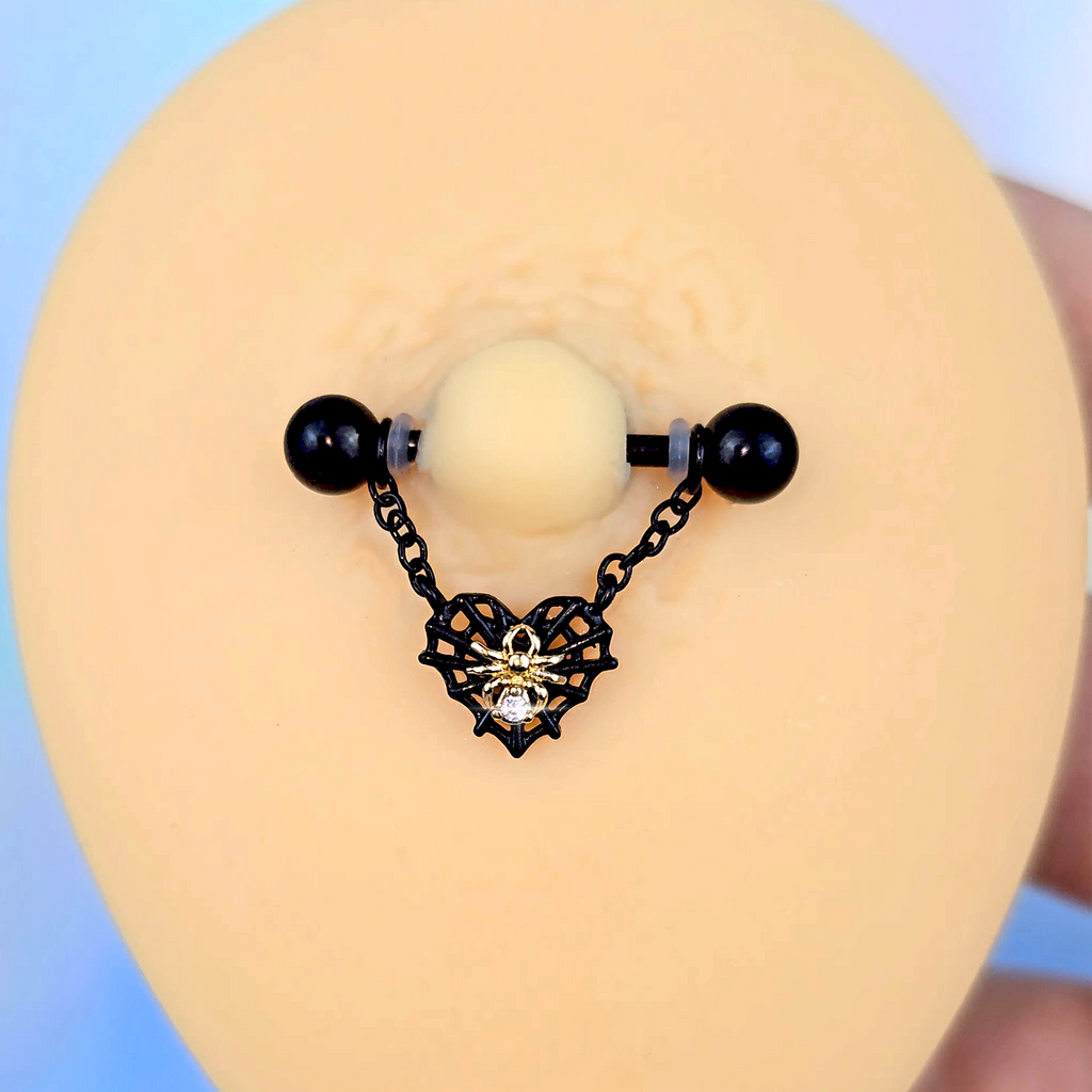 BodyCandy 14G 9/16 Clear Gem Black Golden Spider Web Dangle Nipple Ring Set — detail close-up