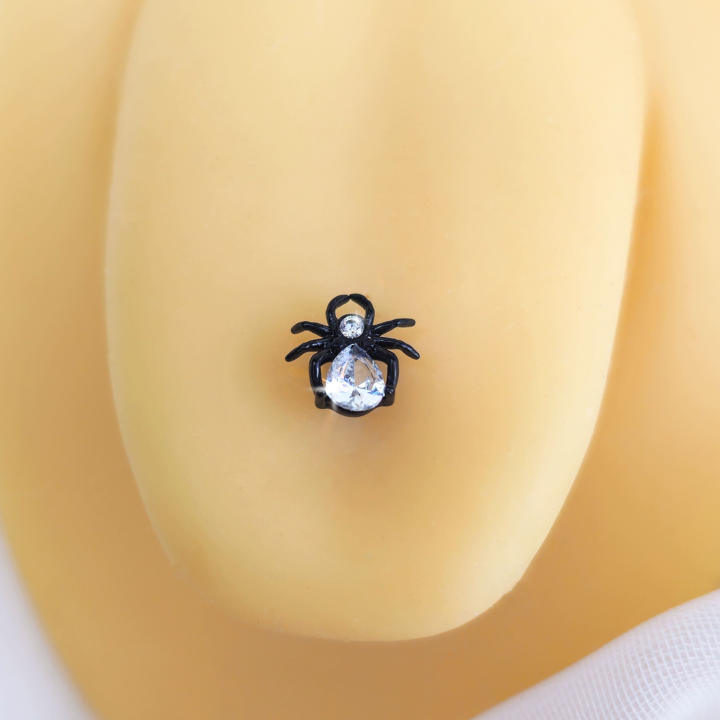 BodyCandy Clear Gem Black Sharp Looking Spider Barbell Tongue Ring — detail close-up
