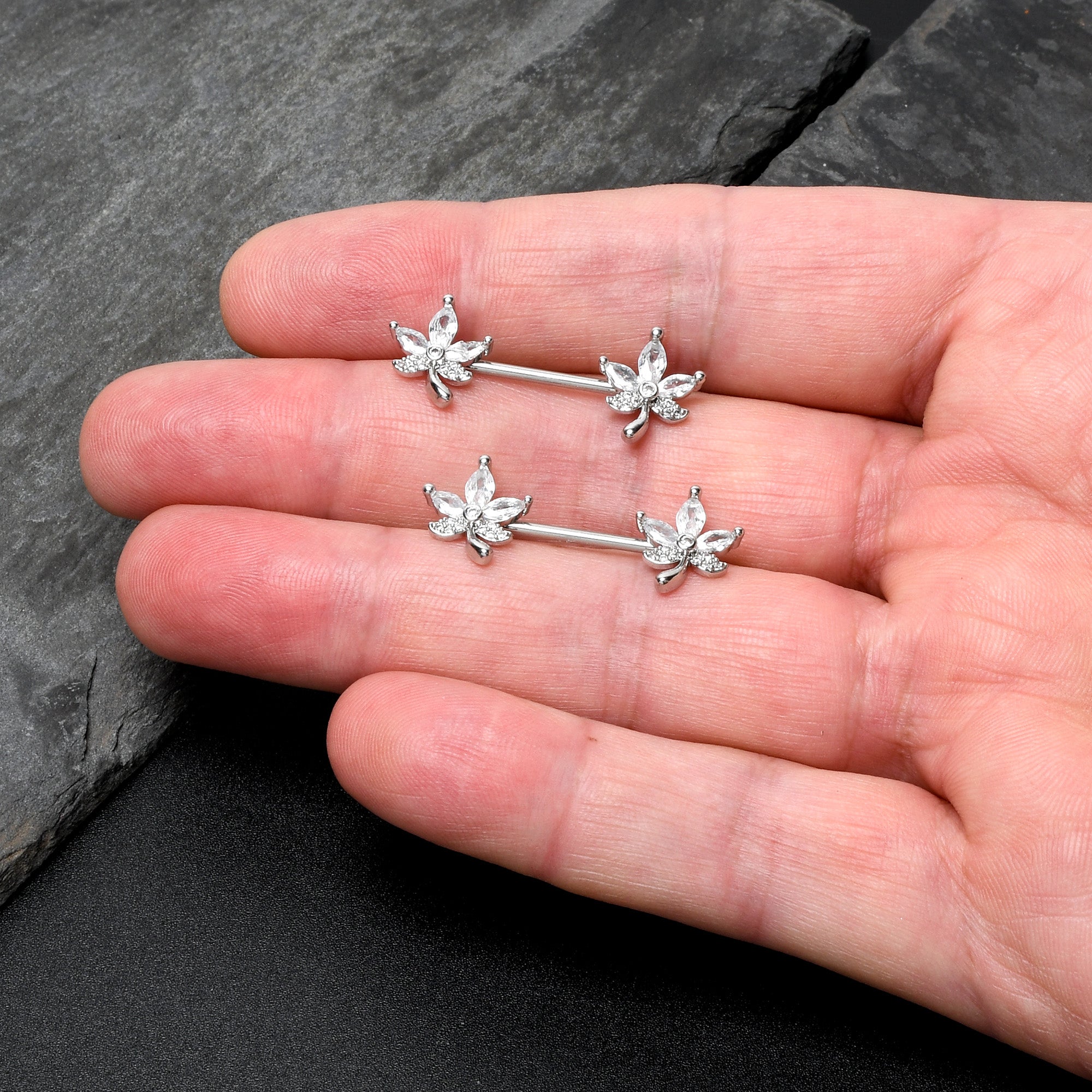 BodyCandy 14G 3/4 Clear CZ Gem Pot Leaf Barbell Nipple Ring Set — in-use photo