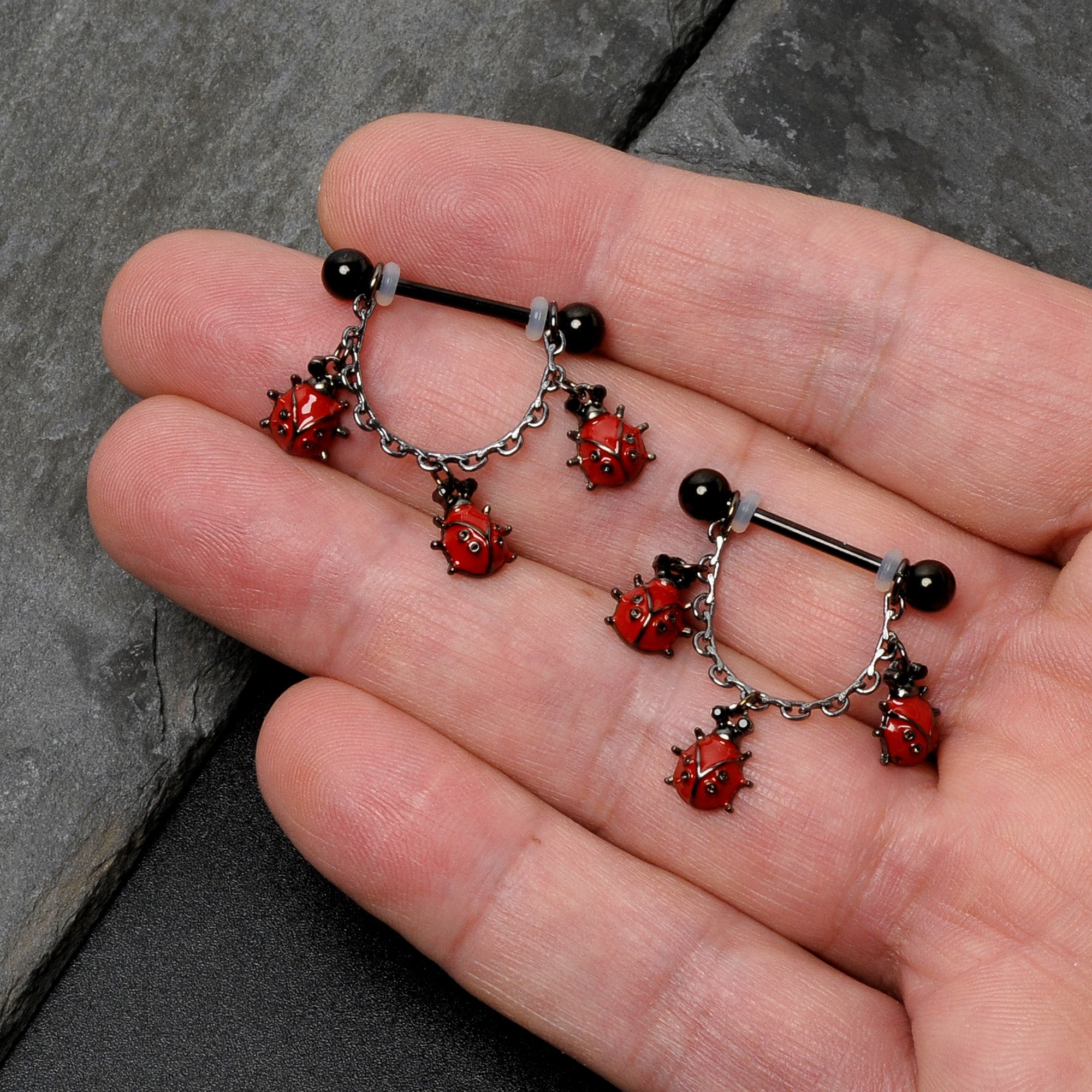 BodyCandy 14G 9/16 Black Classic Ladybug Dangle Nipple Ring Set — in-use photo