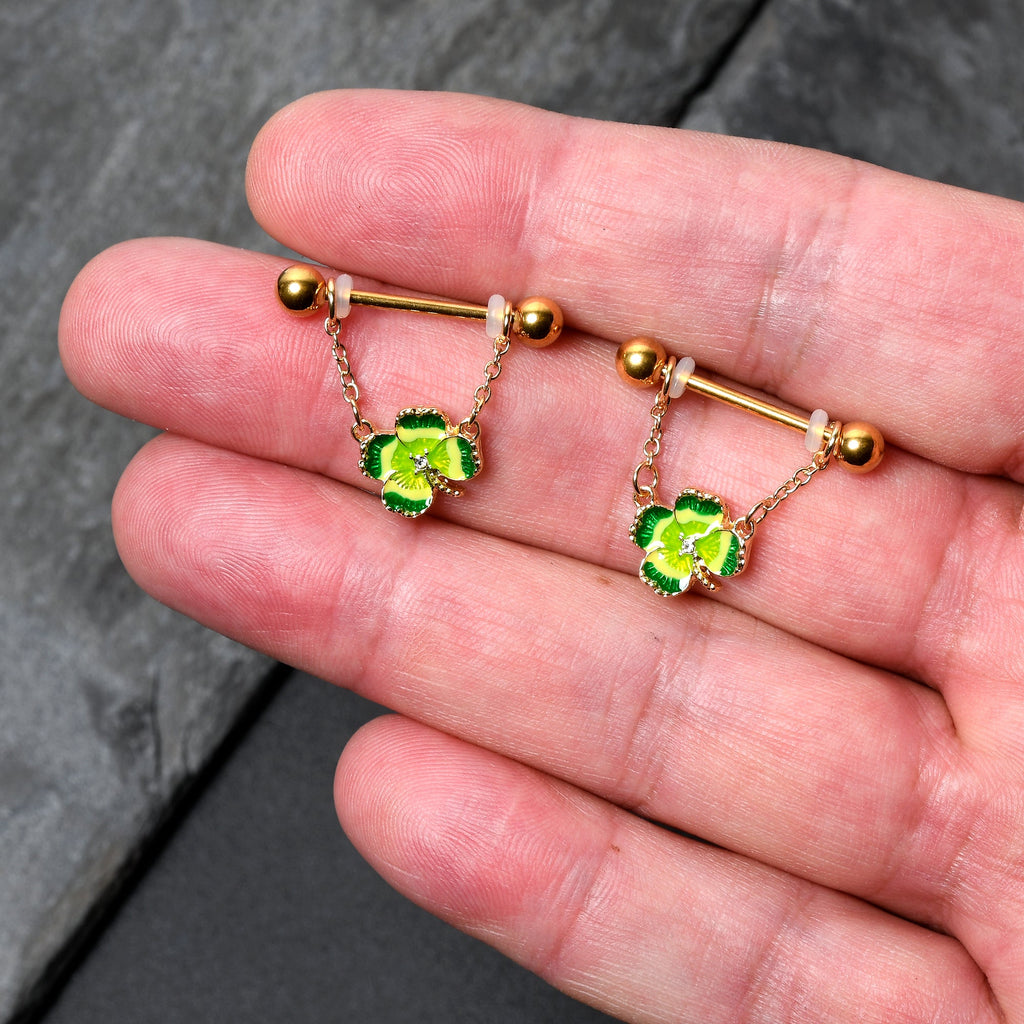 BodyCandy 14G 9/16 Clear Gem Gold Hue Lucky Shamrock Dangle Nipple Ring Set — detail close-up