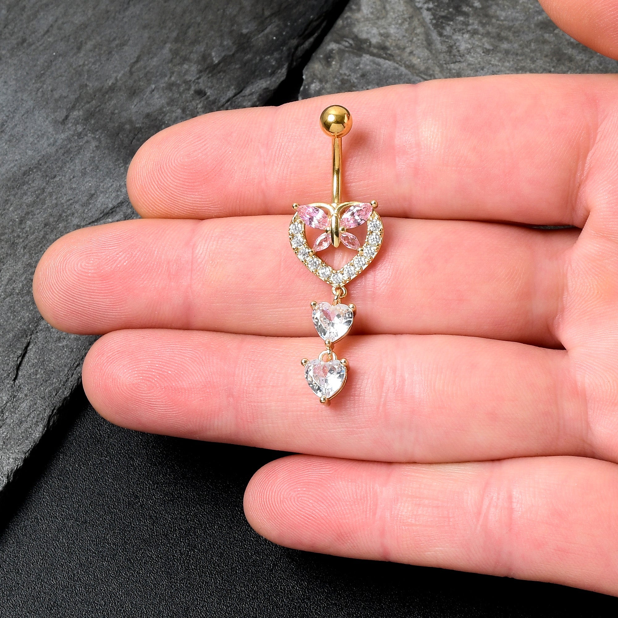 BodyCandy Clear Pink CZ Gem Gold Tone Heart Butterfly Double Dangle Belly Ring — detail close-up