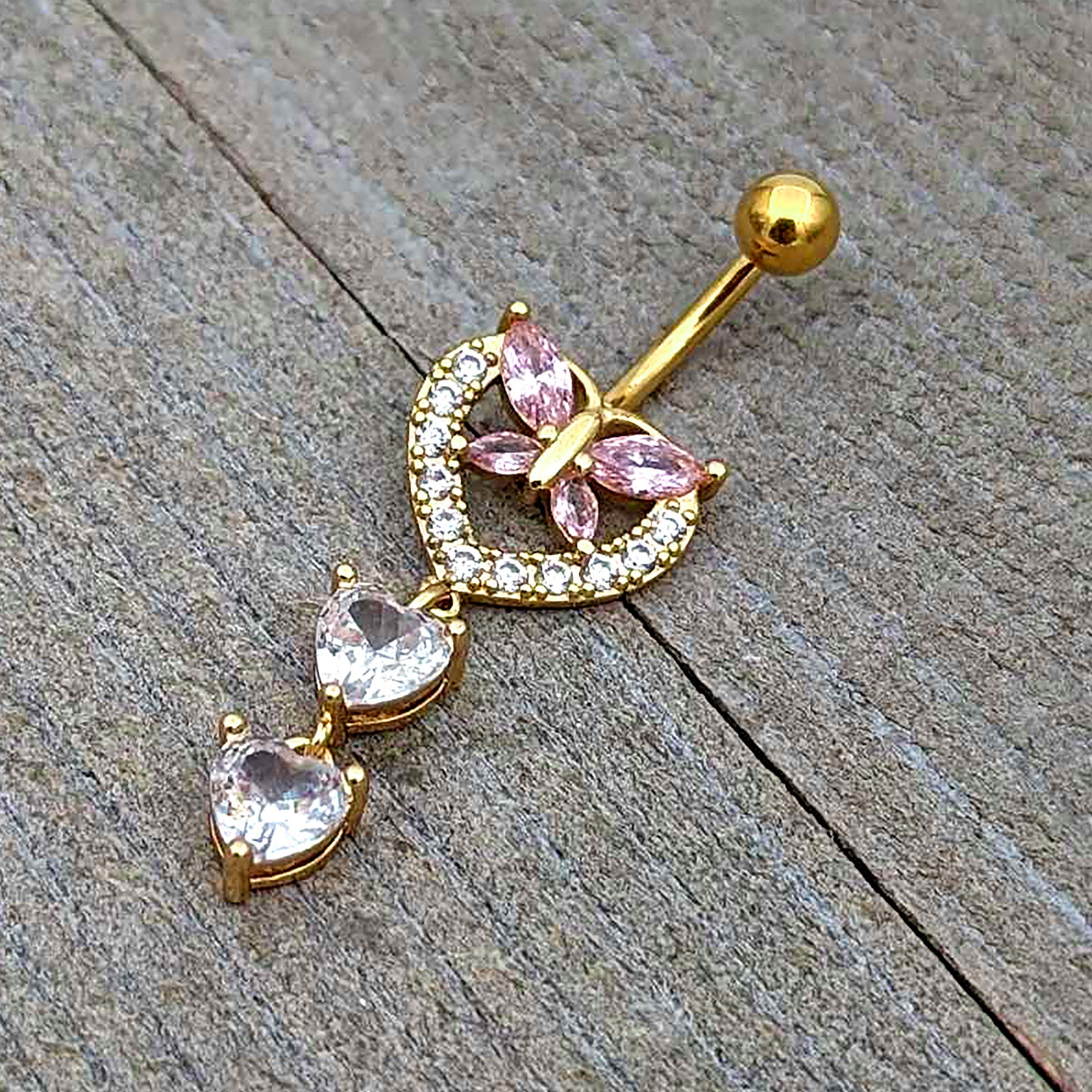BodyCandy Clear Pink CZ Gem Gold Tone Heart Butterfly Double Dangle Belly Ring — in-use photo